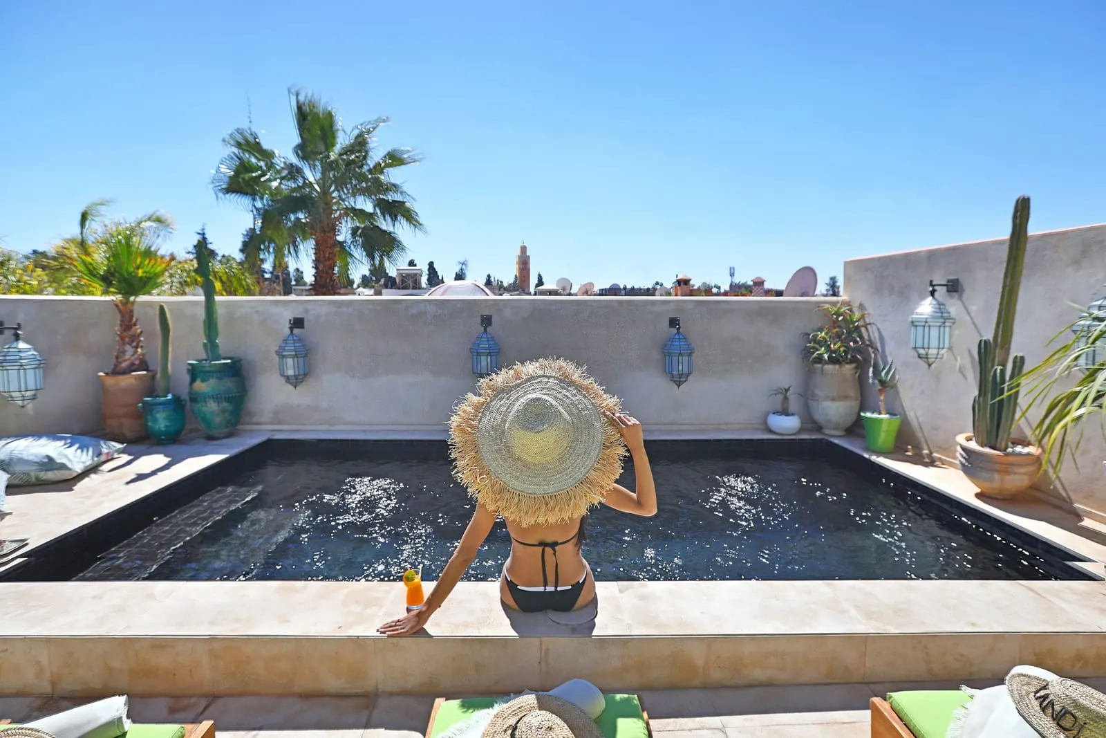 Dar Kandi: The rooftop pool, with the Koutoubia beyond