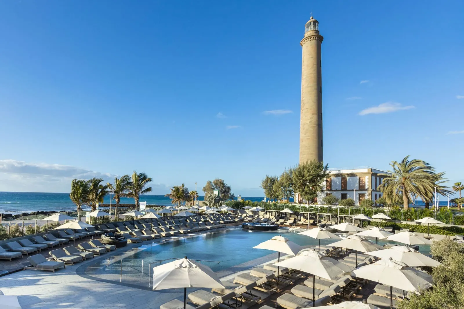 Hotel Faro, a Lopesan Collection Hotel: The main pool beside the Maspalomas lighthouse