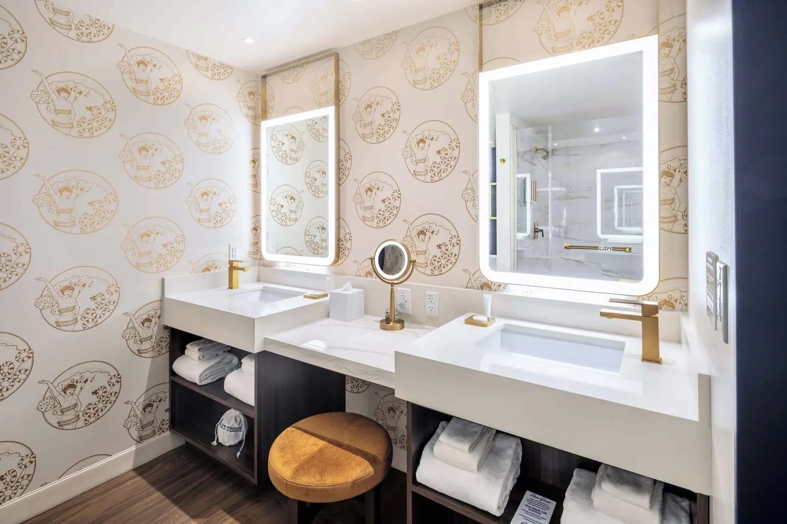 Circa Resort & Casino: Twin basins and lit mirrors in the bathroom