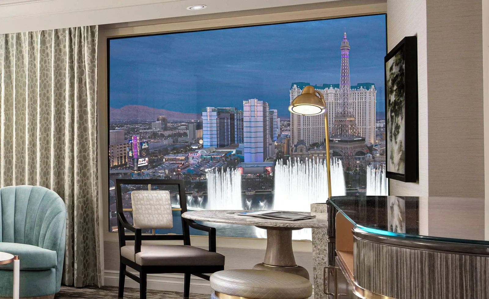 Bellagio: The fountains from a lake-facing room at dusk