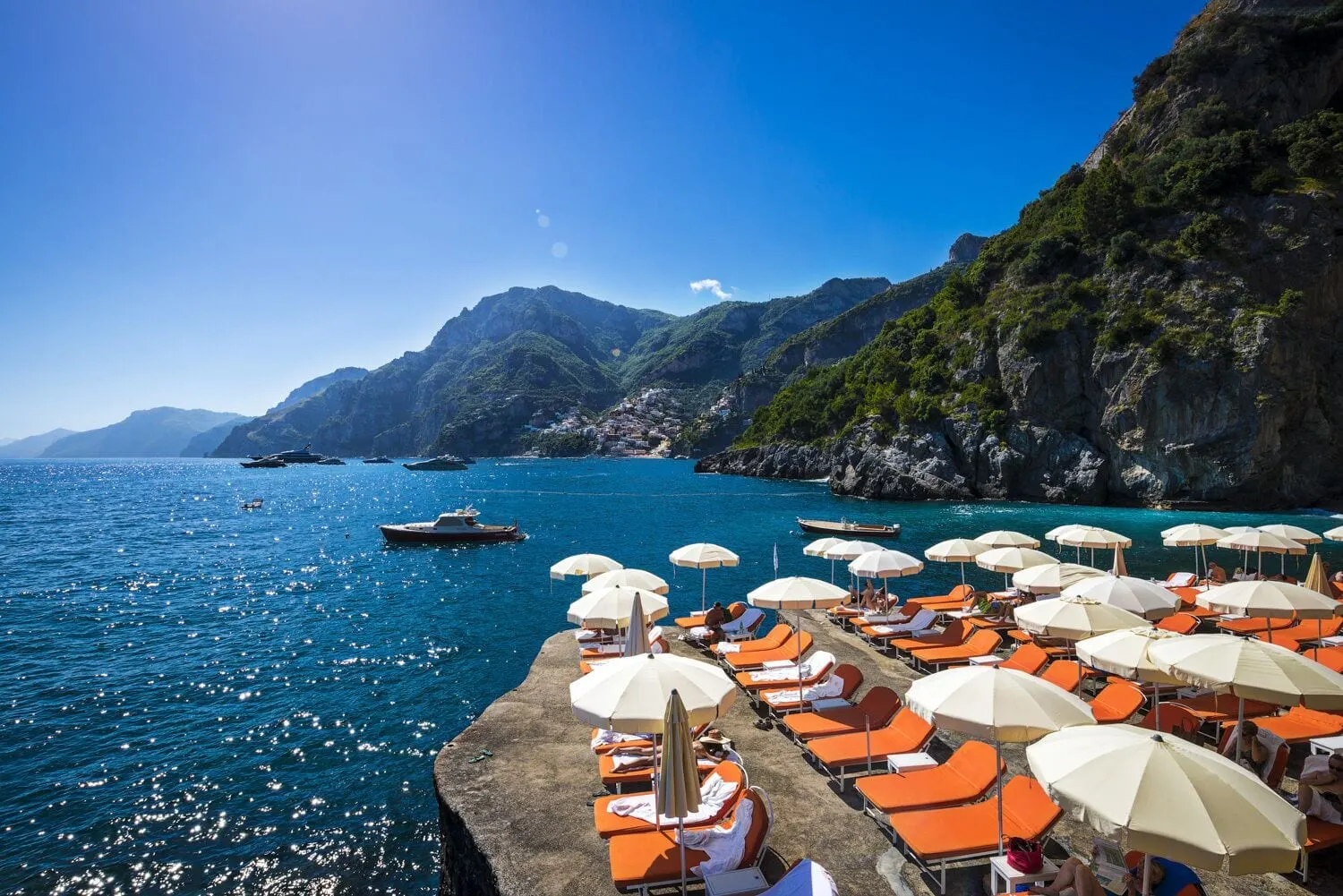 Il San Pietro di Positano: The beach club sun deck on the hotel's cove