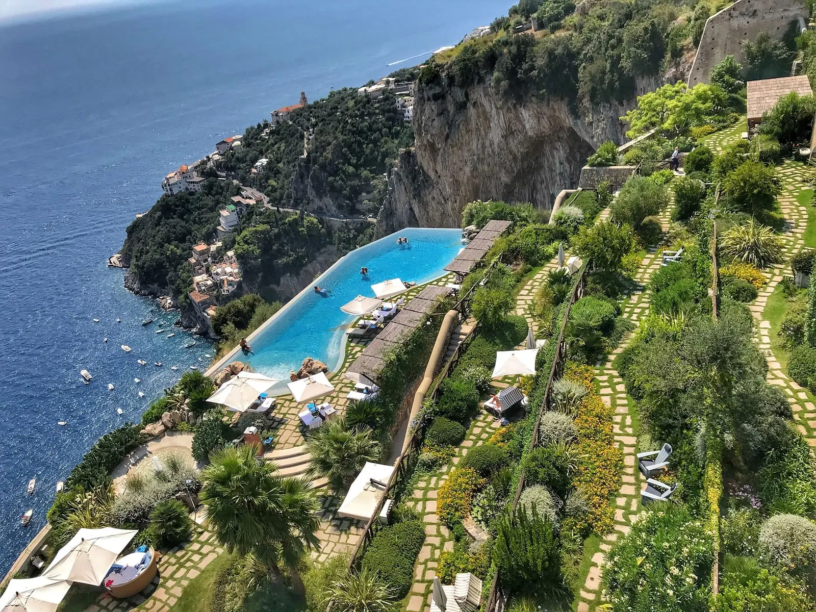 Monastero Santa Rosa Hotel & Spa: The infinity pool and terraced gardens above the sea