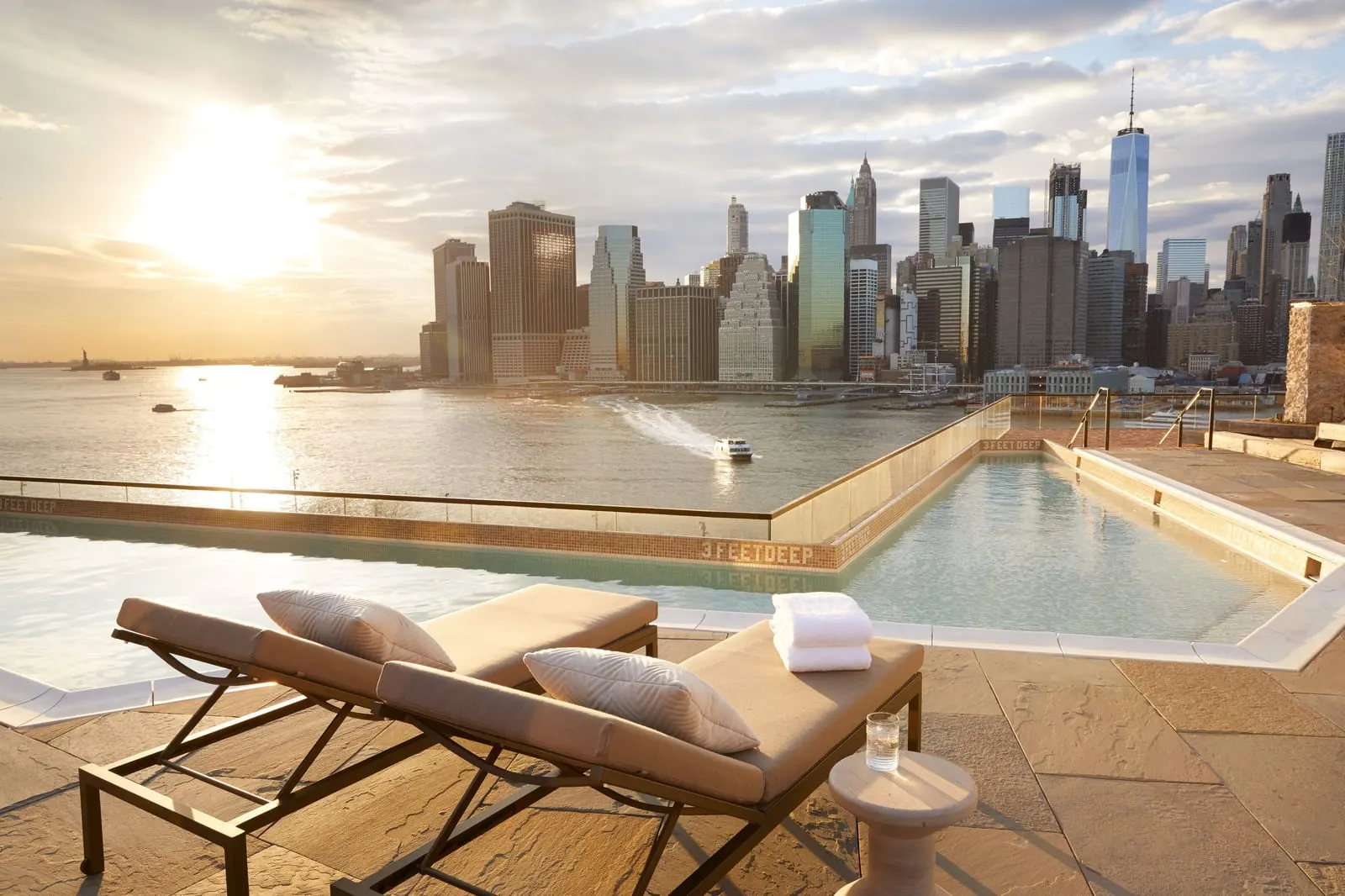 1 Hotel Brooklyn Bridge: The rooftop plunge pool, looking across the river to Lower Manhattan