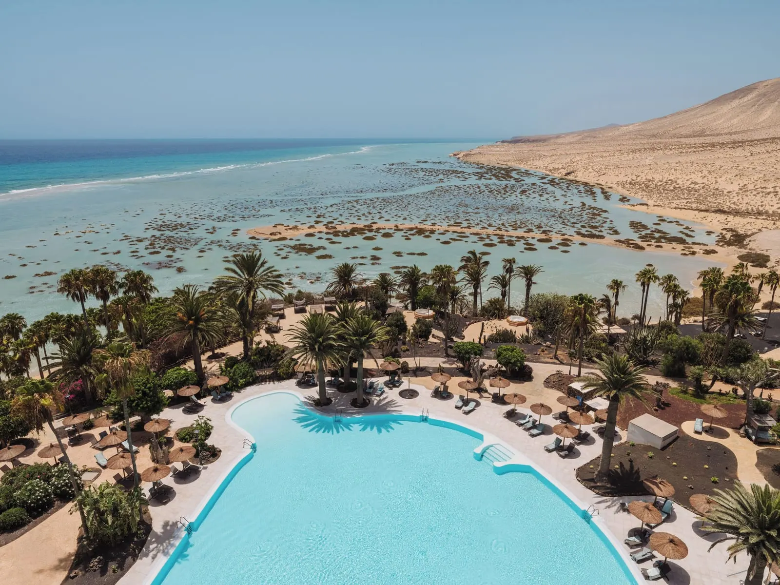 Paradisus by Meliá Fuerteventura: The pool, with the lagoon filled at a spring tide