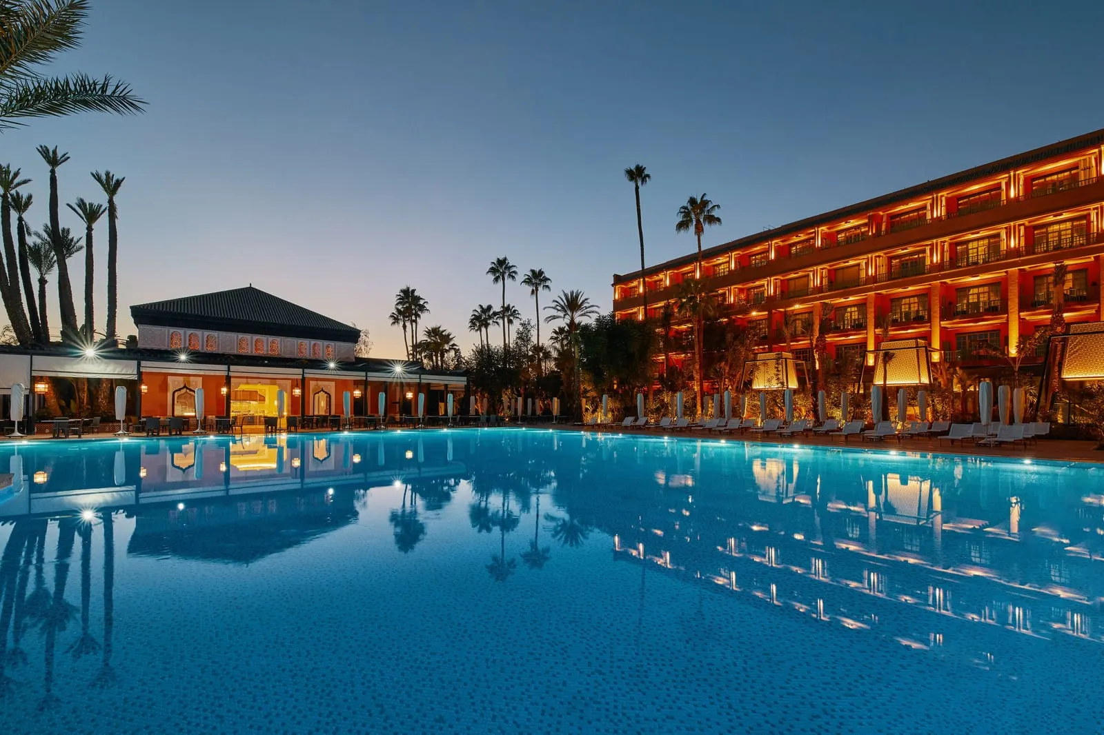 La Mamounia: The pool and hotel at dusk