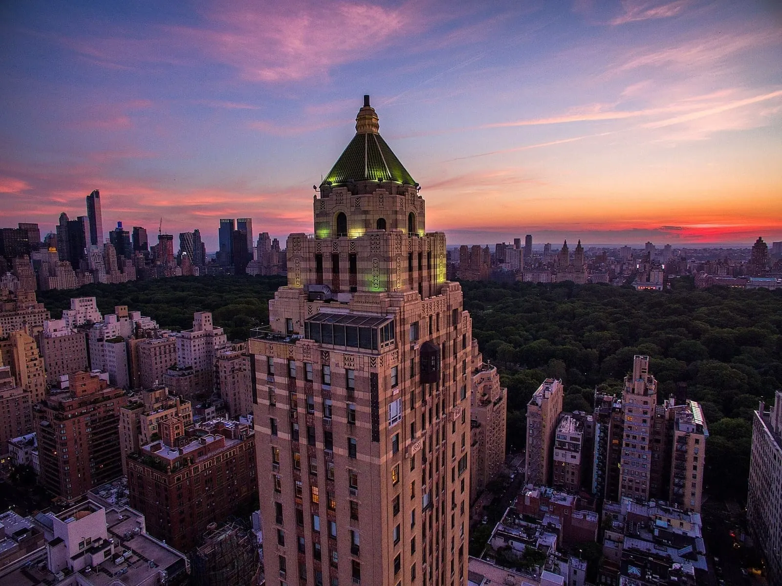 Central Park at dusk beyond the Upper East Side towers