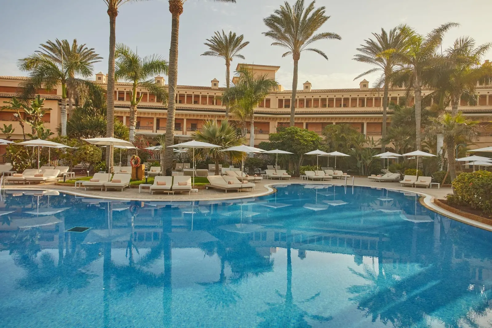 Secrets Bahía Real Resort & Spa: One of the two pools in the tropical gardens