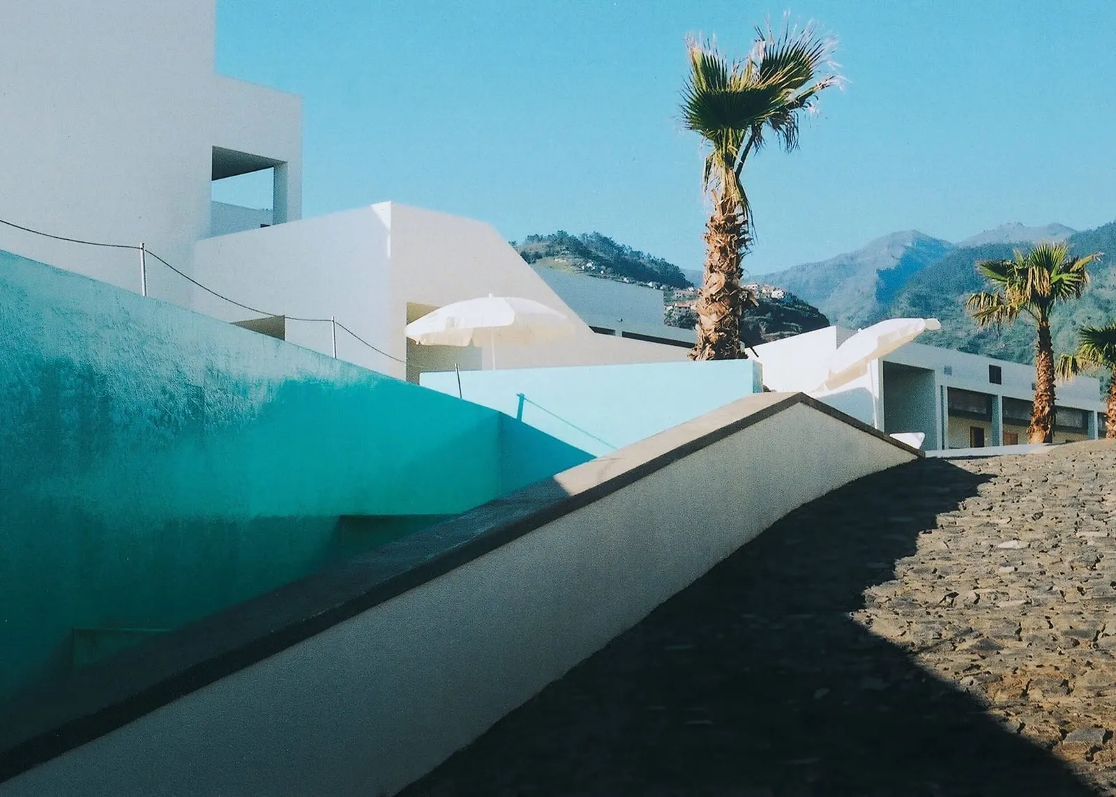 Estalagem da Ponta do Sol: Sharp white angles against the mountains