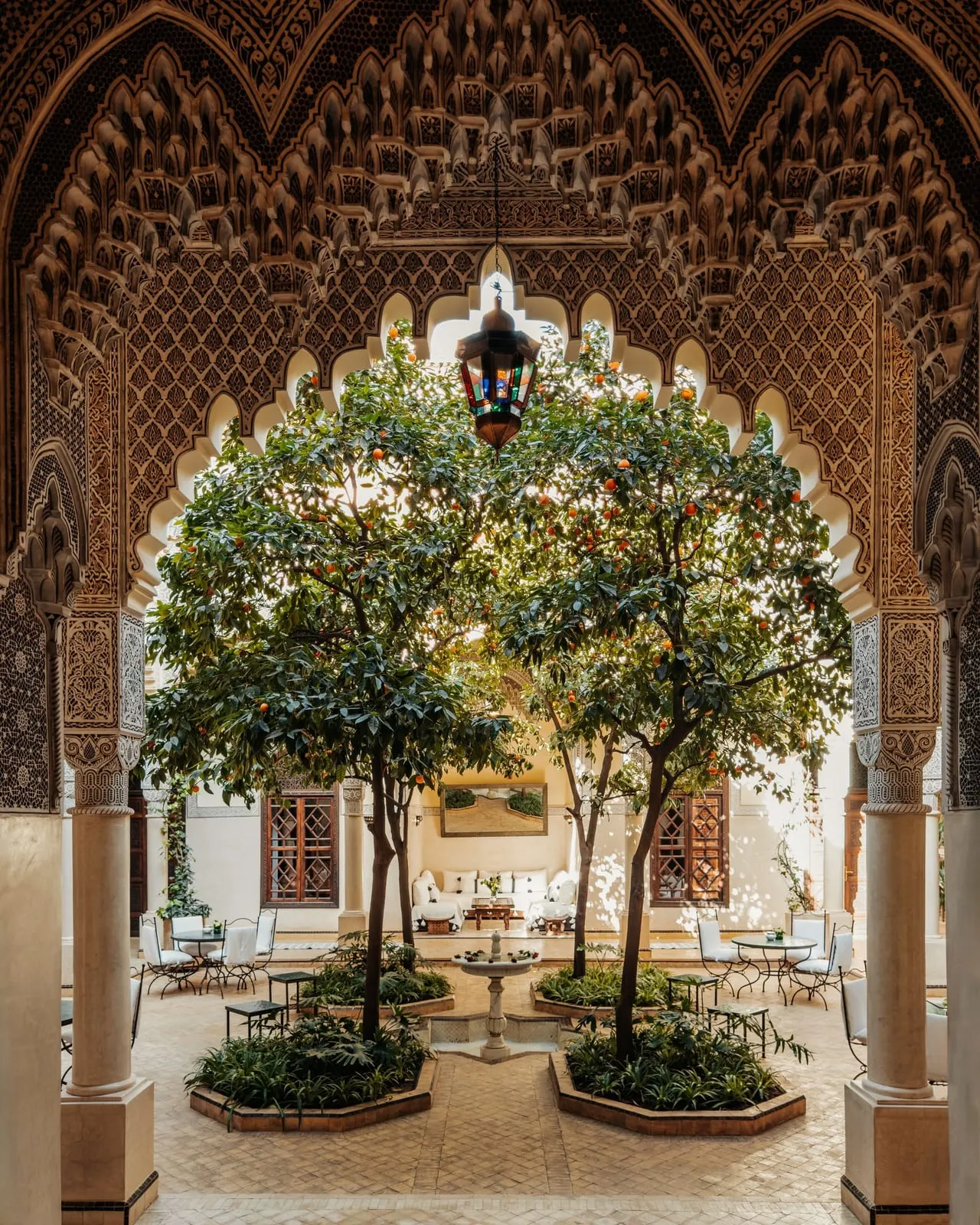 La Villa des Orangers: Orange trees under a carved arch