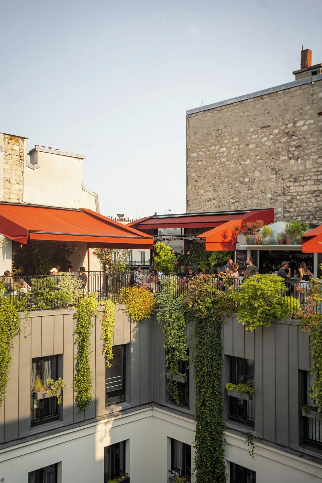 Grands Boulevards Experimental: The Shed rooftop bar under red awnings