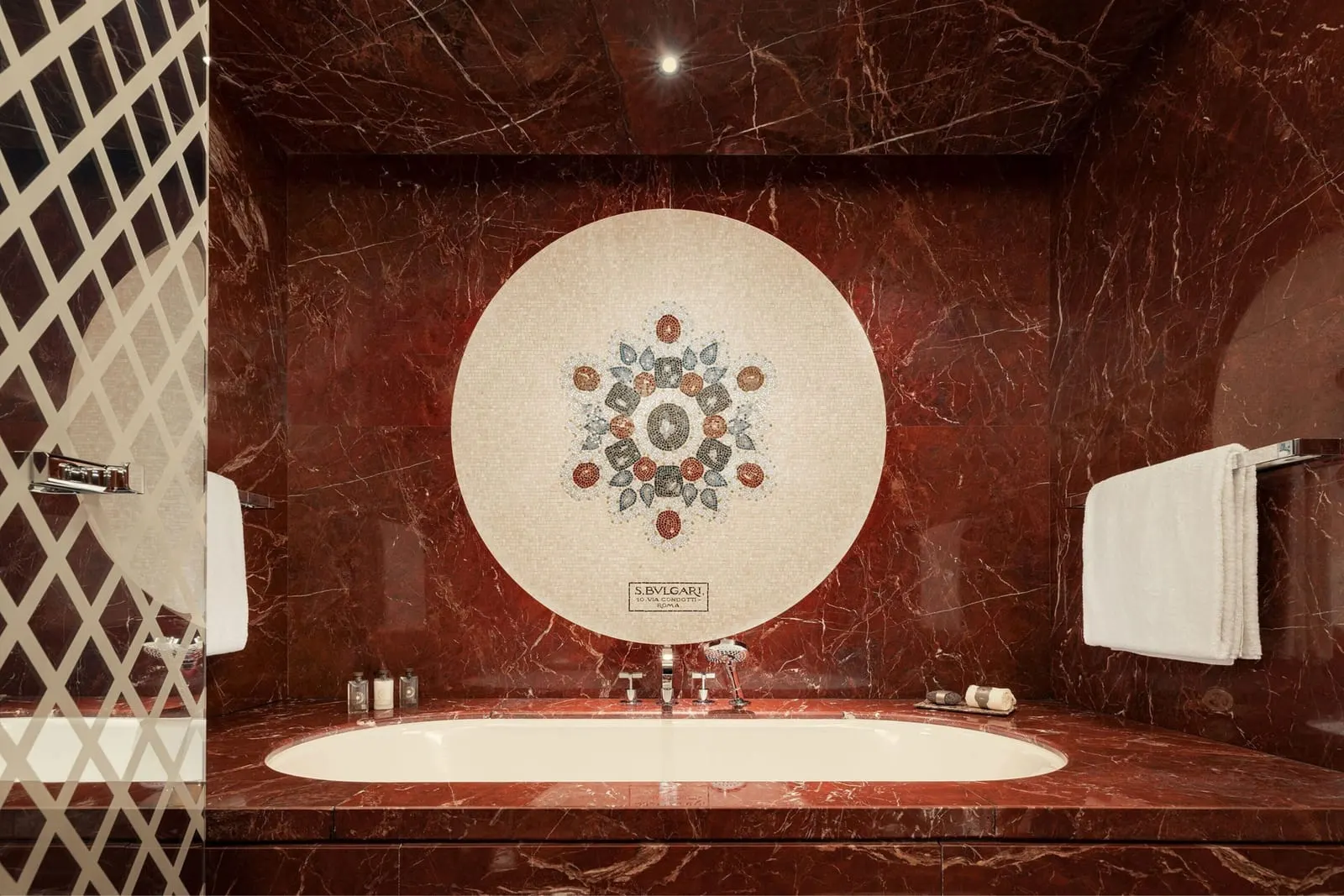 Bvlgari Hotel Roma: Red marble, and a mosaic set in the floor