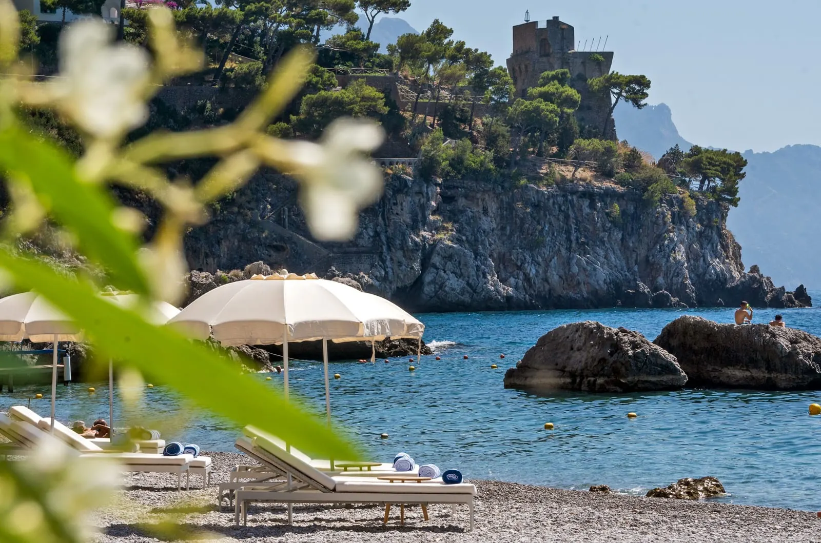 Borgo Santandrea: Loungers on the hotel's private pebble beach