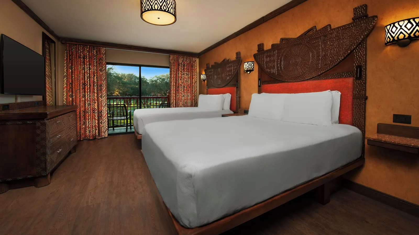 Disney's Animal Kingdom Lodge: A two-queen room opening onto its balcony