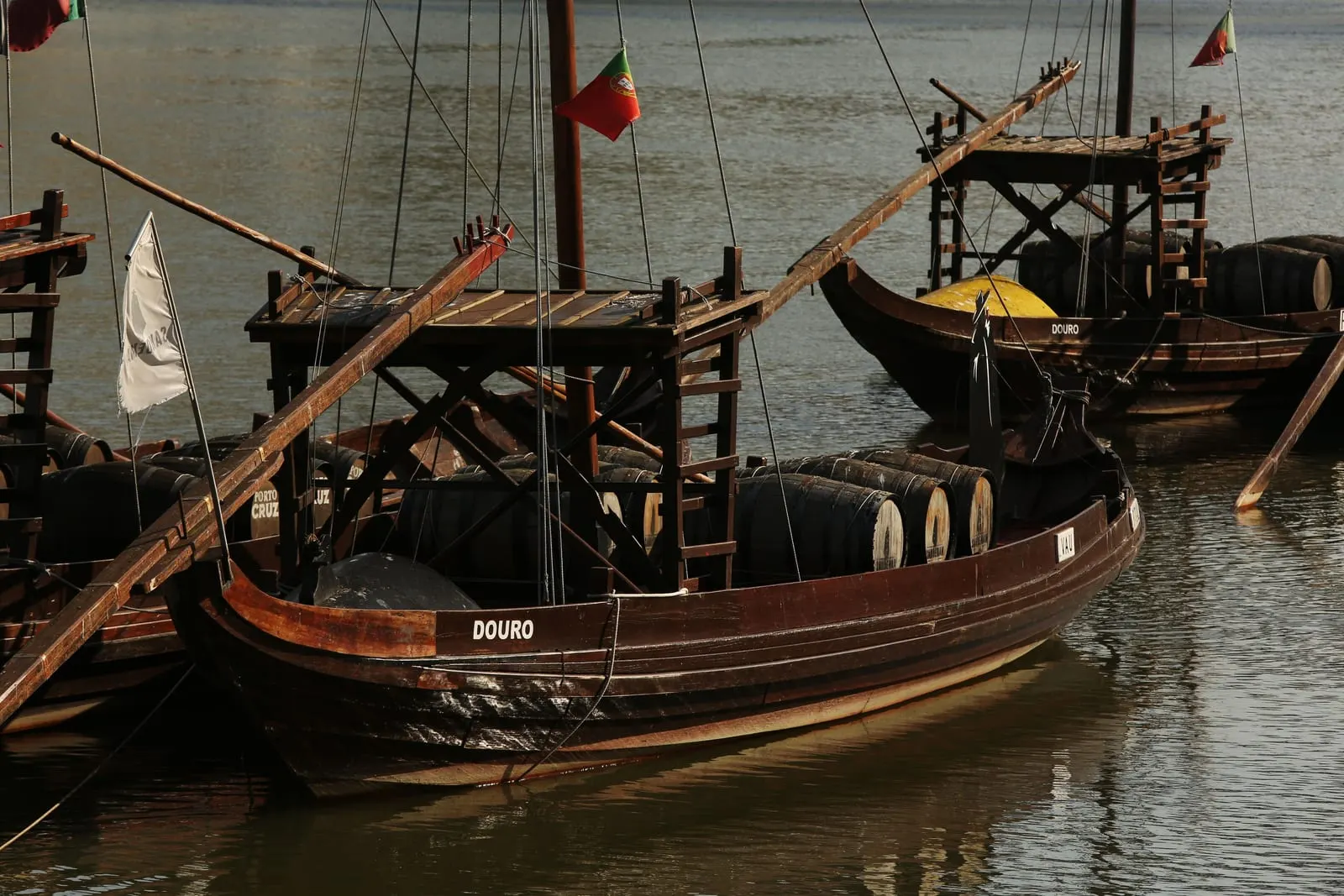 1872 River House: A rabelo boat moored outside