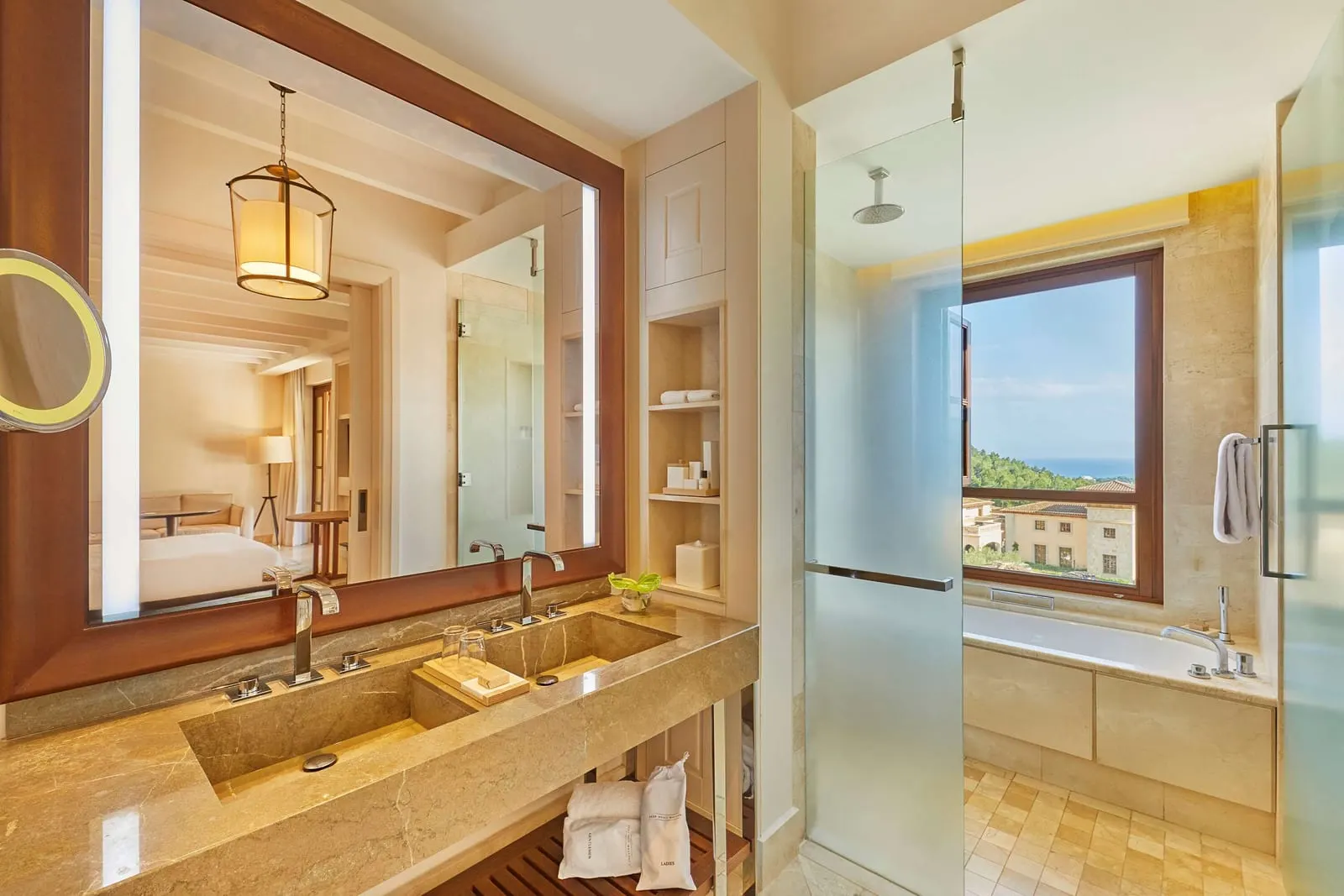 Cap Vermell Grand Hotel: A junior suite's marble bathroom with bath and shower