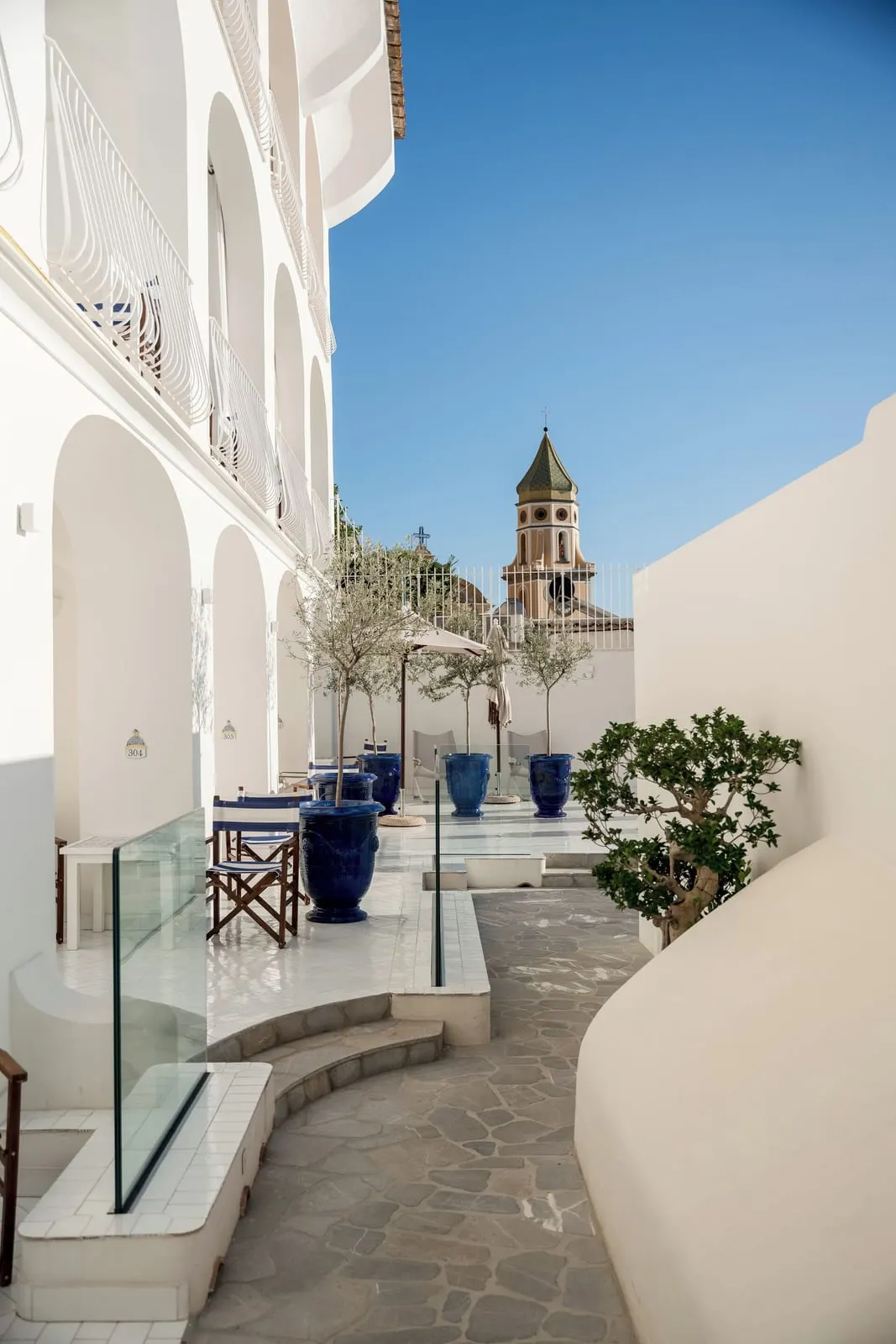 Hotel Tramonto d'Oro: Whitewashed terraces below San Gennaro's bell tower