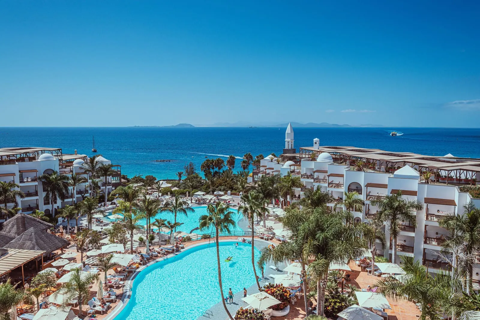 Lanzarote: the pools of Princesa Yaiza at Playa Blanca, with Fuerteventura across the strait
