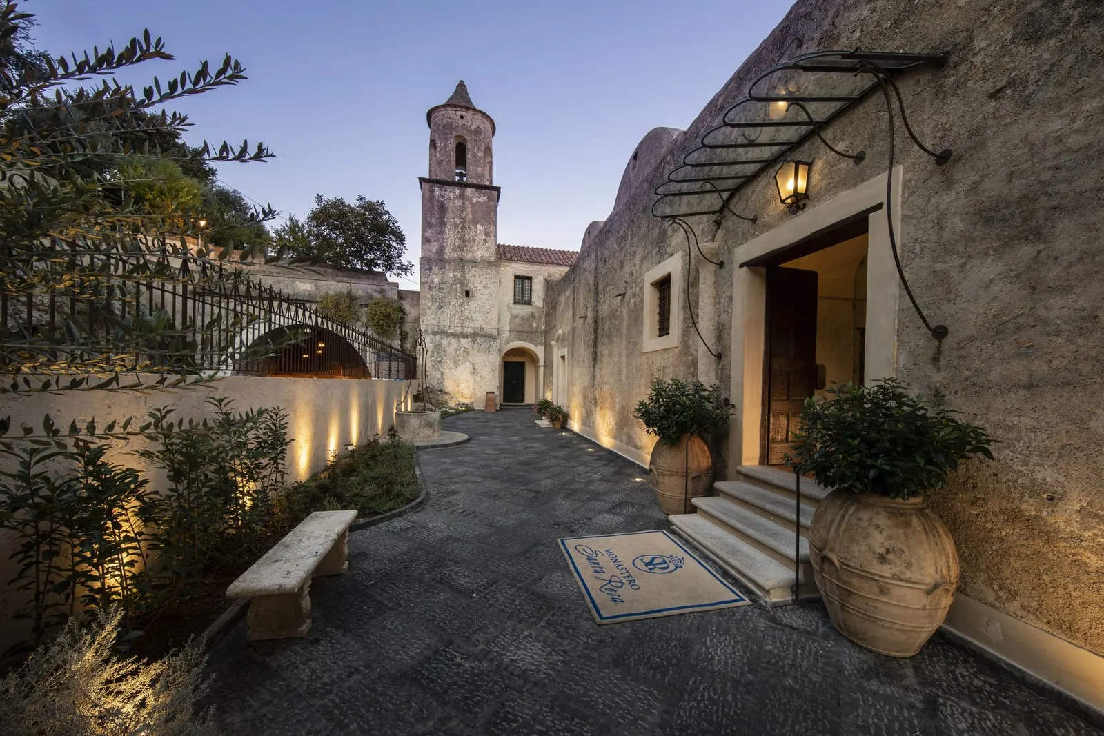 Monastero Santa Rosa Hotel & Spa: The monastery entrance beside its bell tower