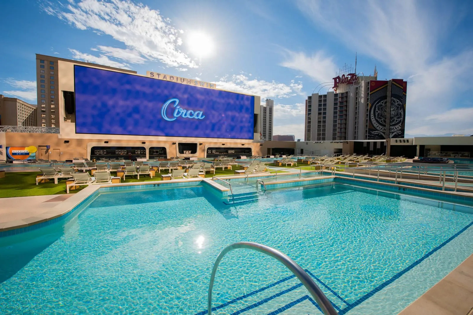 Circa Resort & Casino: A Stadium Swim pool and loungers in the sun