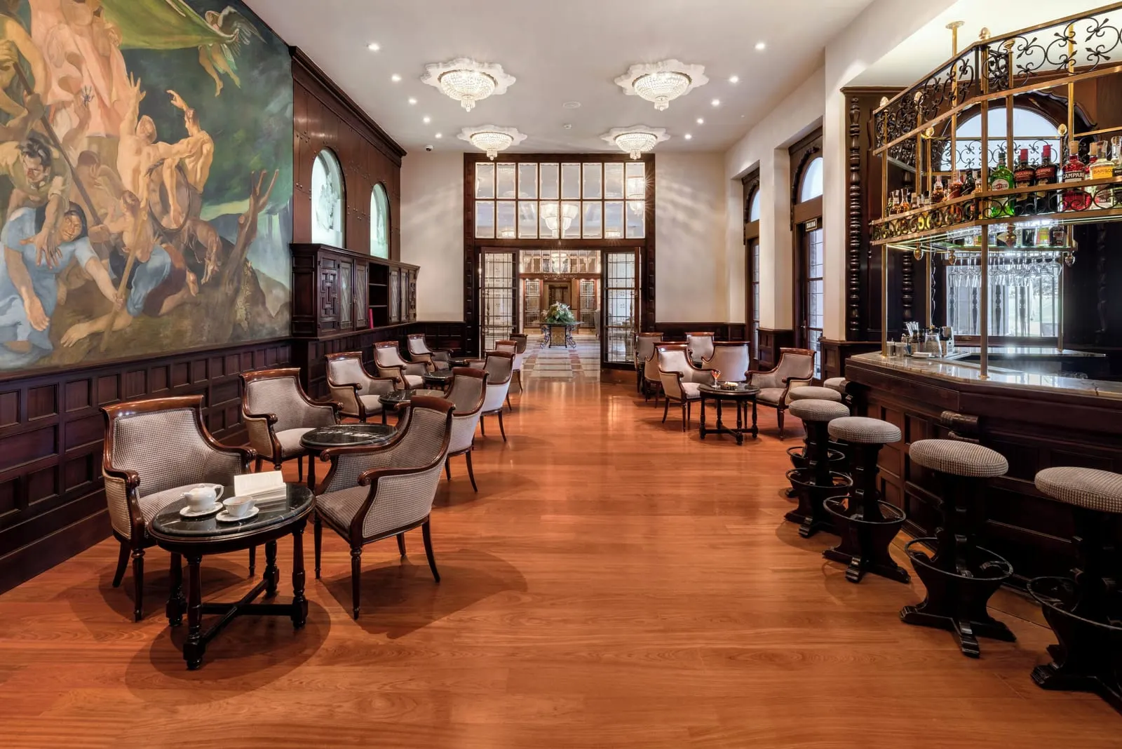 Santa Catalina, a Royal Hideaway Hotel: The Carabela bar, wood-panelled beneath a mural