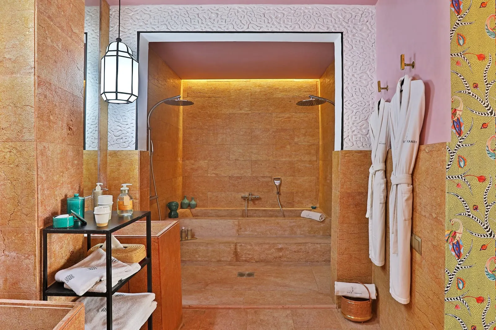 Dar Kandi: A pink marble bathroom with a double shower