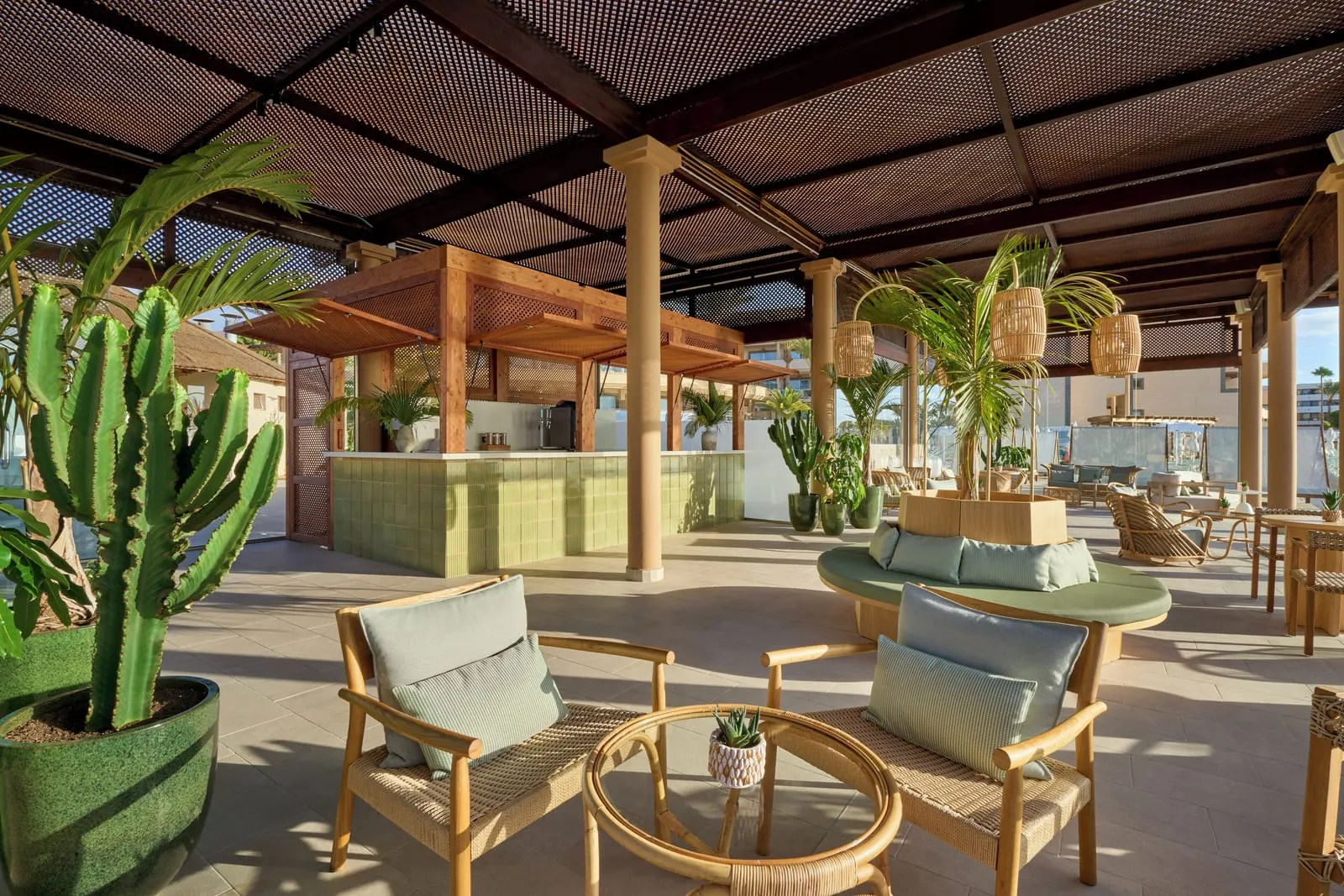 Iberostar Selection Fuerteventura Palace: A shaded bar terrace among cacti and palms