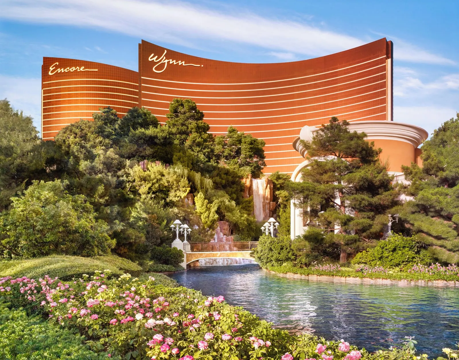 Wynn Las Vegas: The bronze Wynn tower above a waterfall and pond