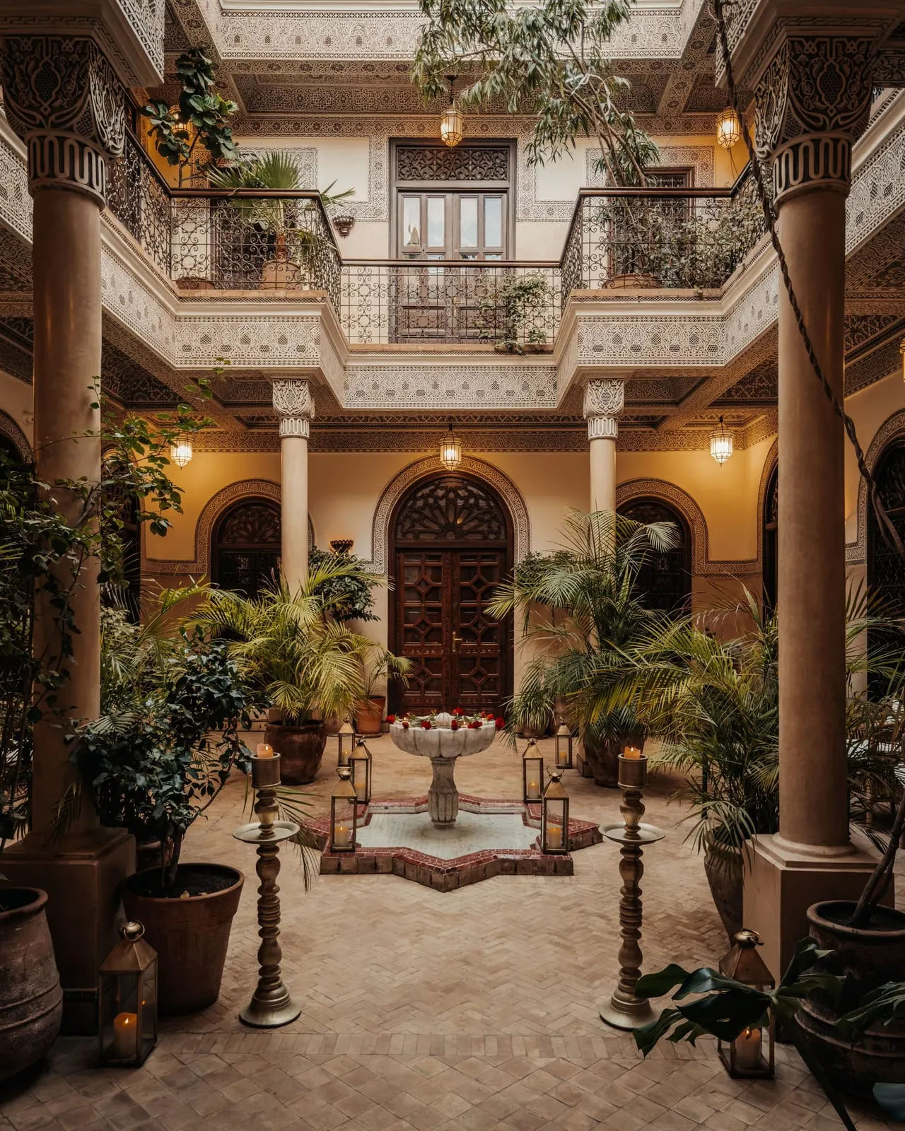 La Villa des Orangers: A courtyard with a fountain and carved galleries