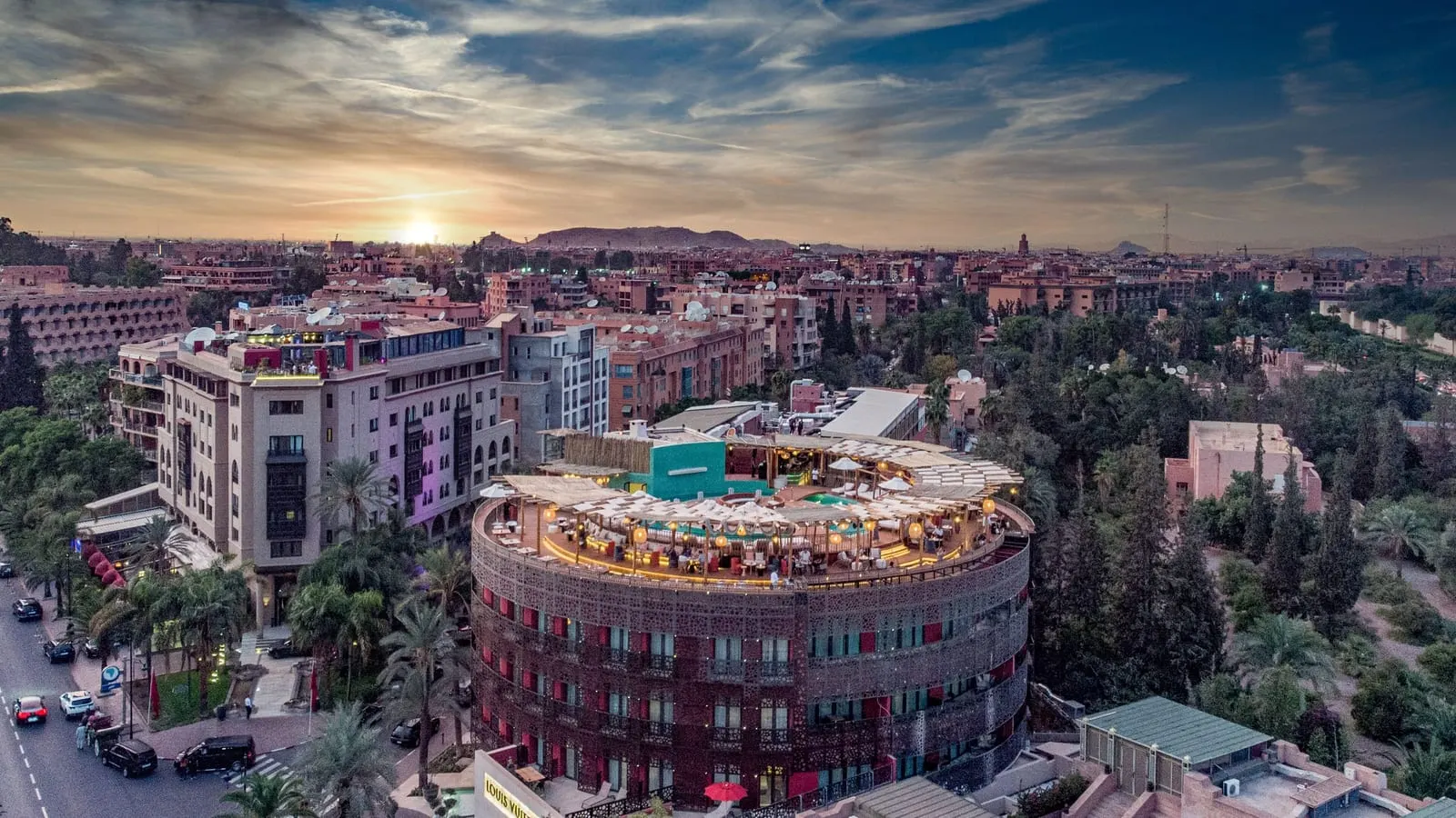 Nobu Hotel Marrakech: The round rose-coloured building and its rooftop