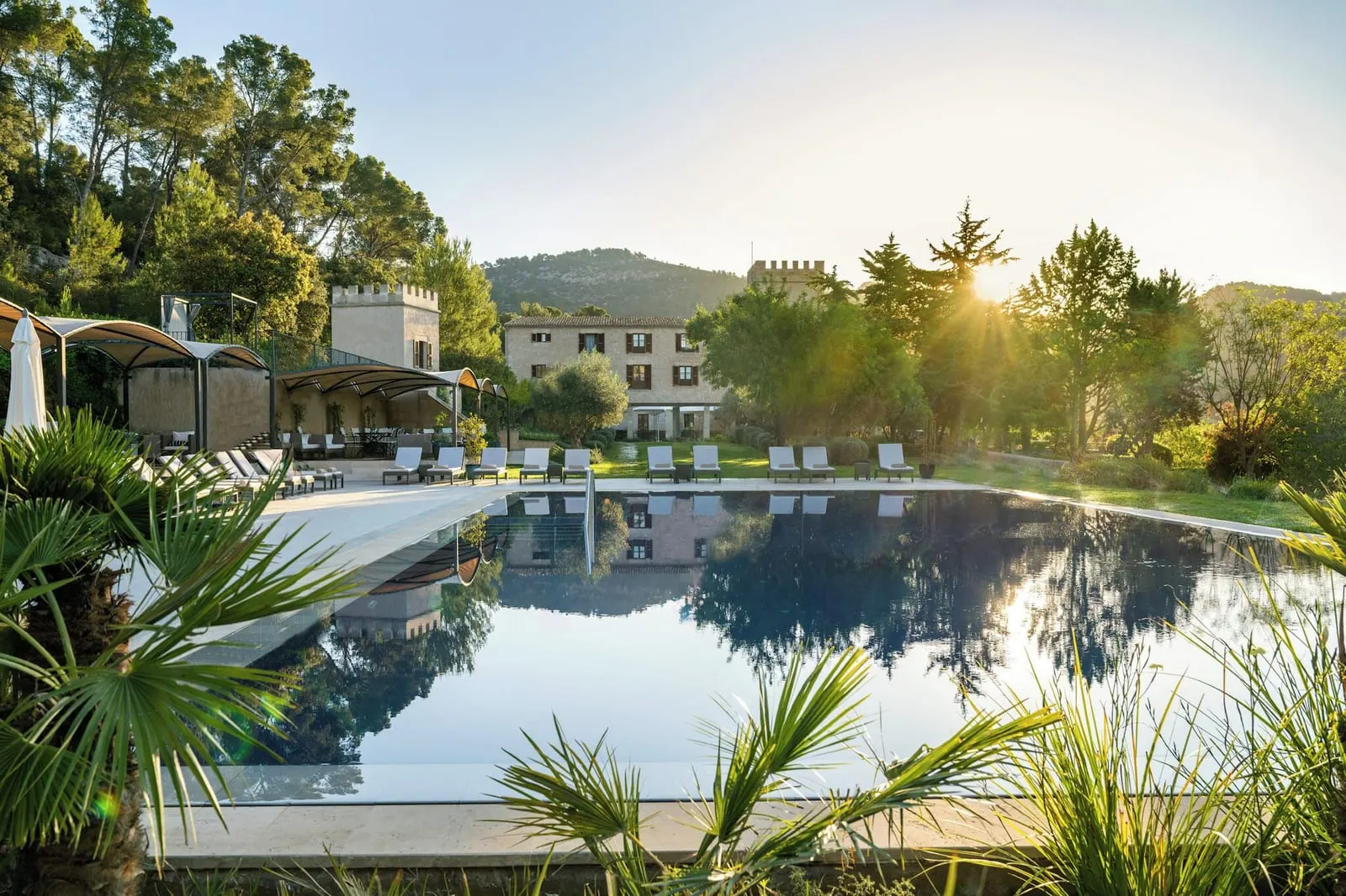 Castell Son Claret: The outdoor pool, with crenellated towers beyond