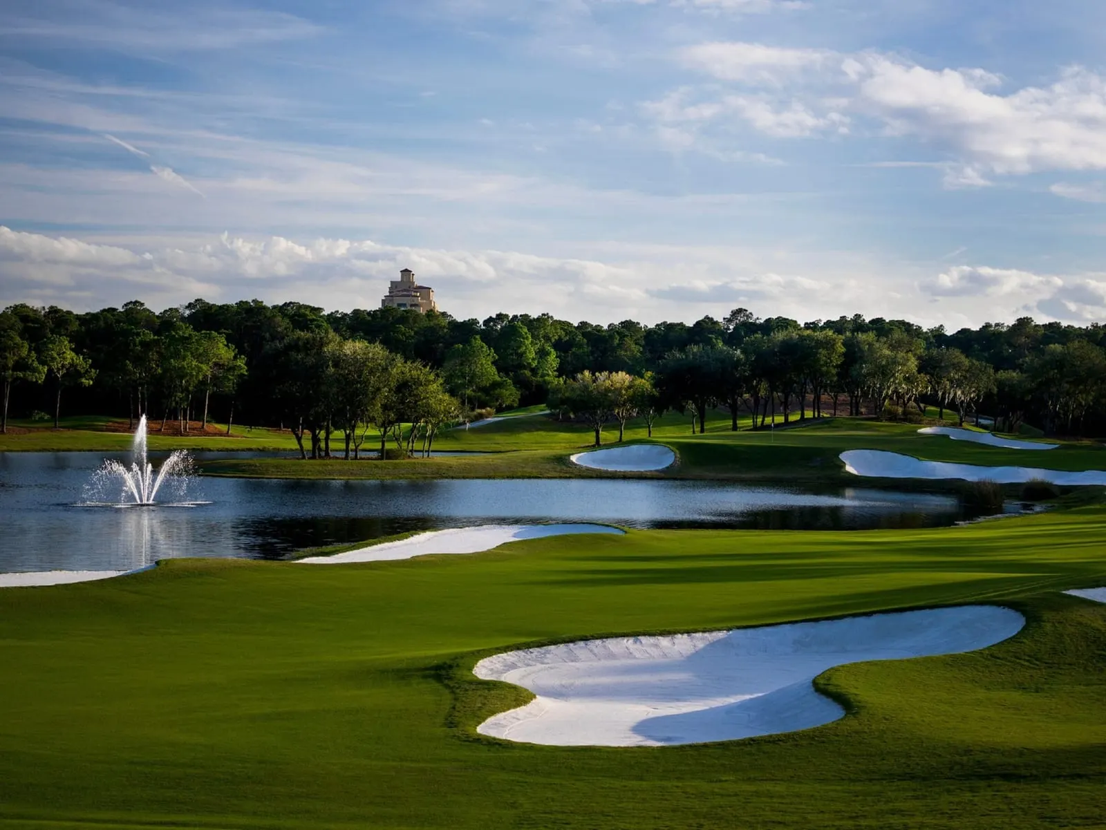 Four Seasons Resort Orlando at Walt Disney World Resort: The golf course, with the resort tower beyond