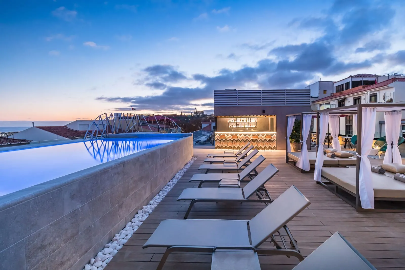 Barceló Funchal Oldtown: The B-Heaven bar and pool deck at dusk