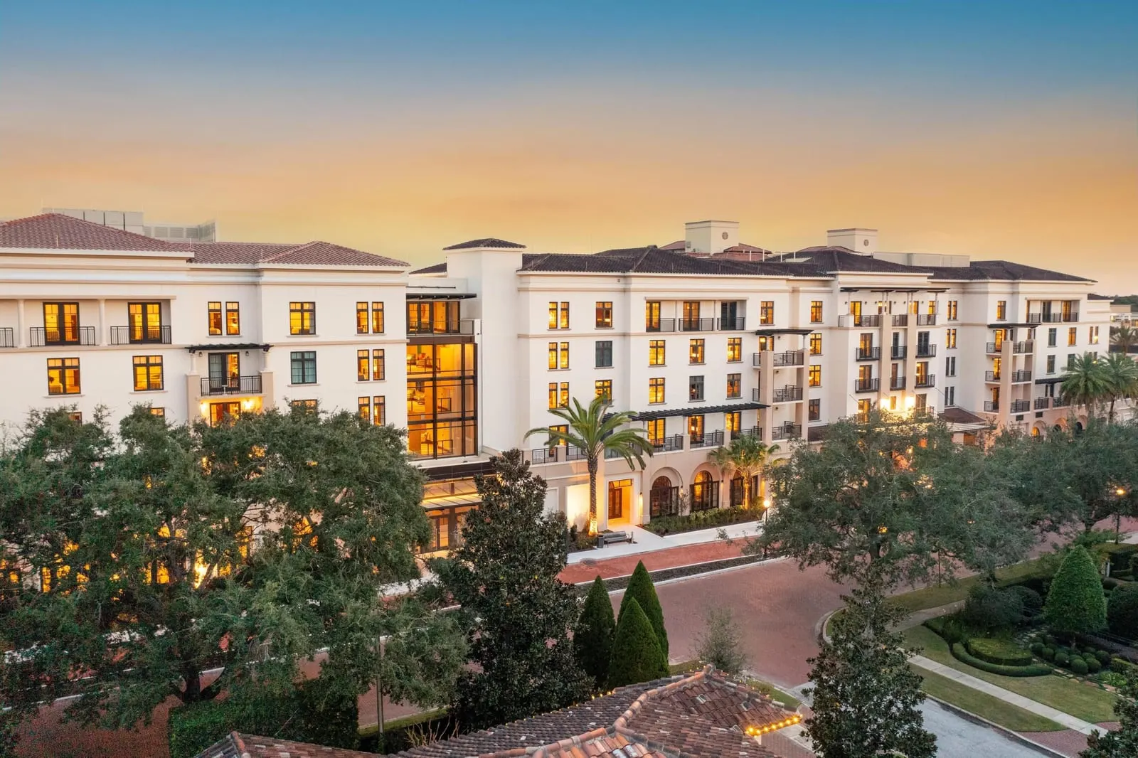 The Alfond Inn: The hotel's tree-lined street front at dusk
