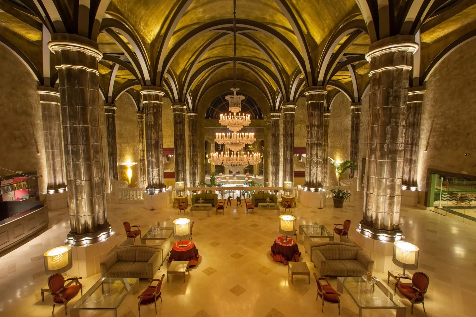 Lopesan Villa del Conde Resort & Thalasso: The gilded lobby under rib vaults and chandeliers
