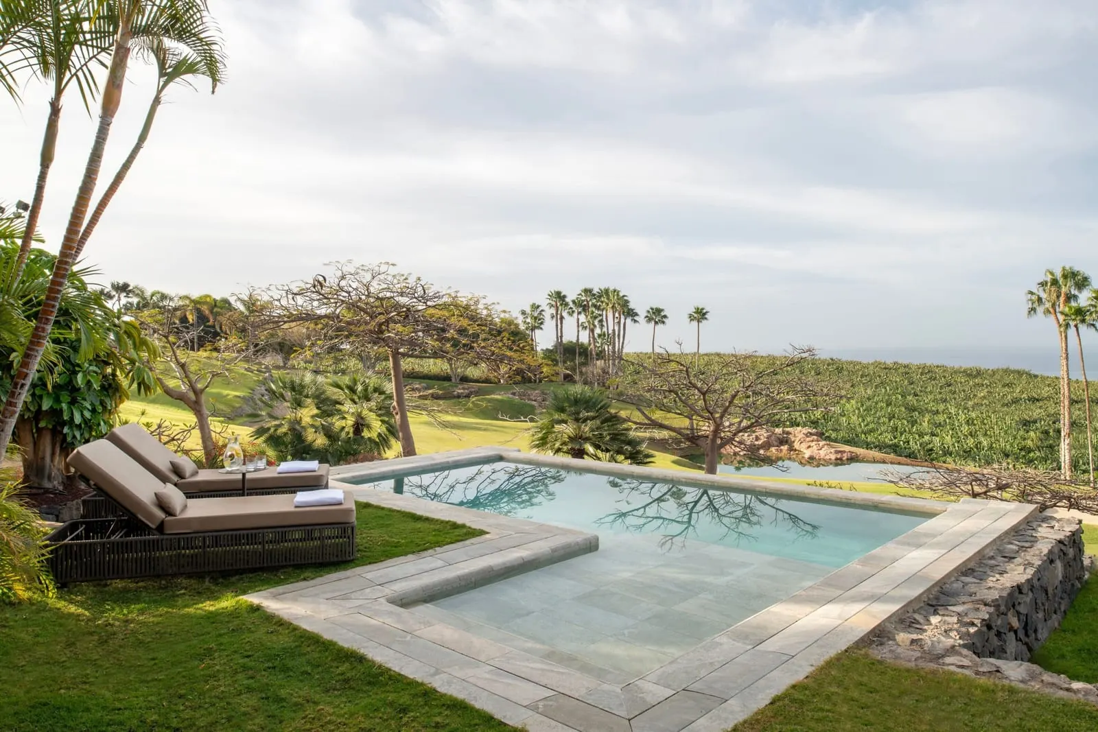 Retreat One Bedroom Suite with Private Pool at the Ritz-Carlton Abama: the pool and two loungers on the lawn