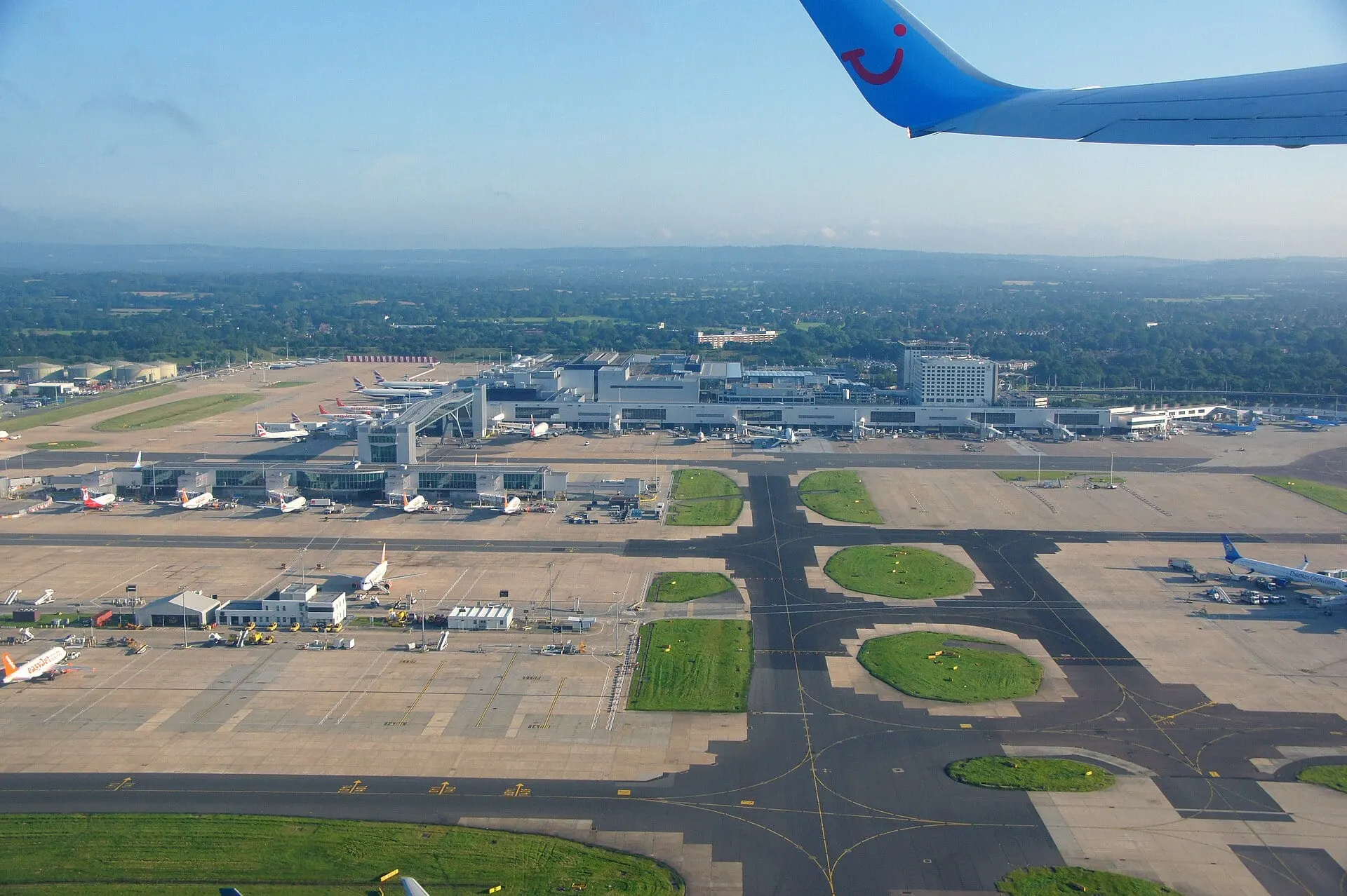 Gatwick North Terminal from the air, with its piers and the sky bridge over the taxiway