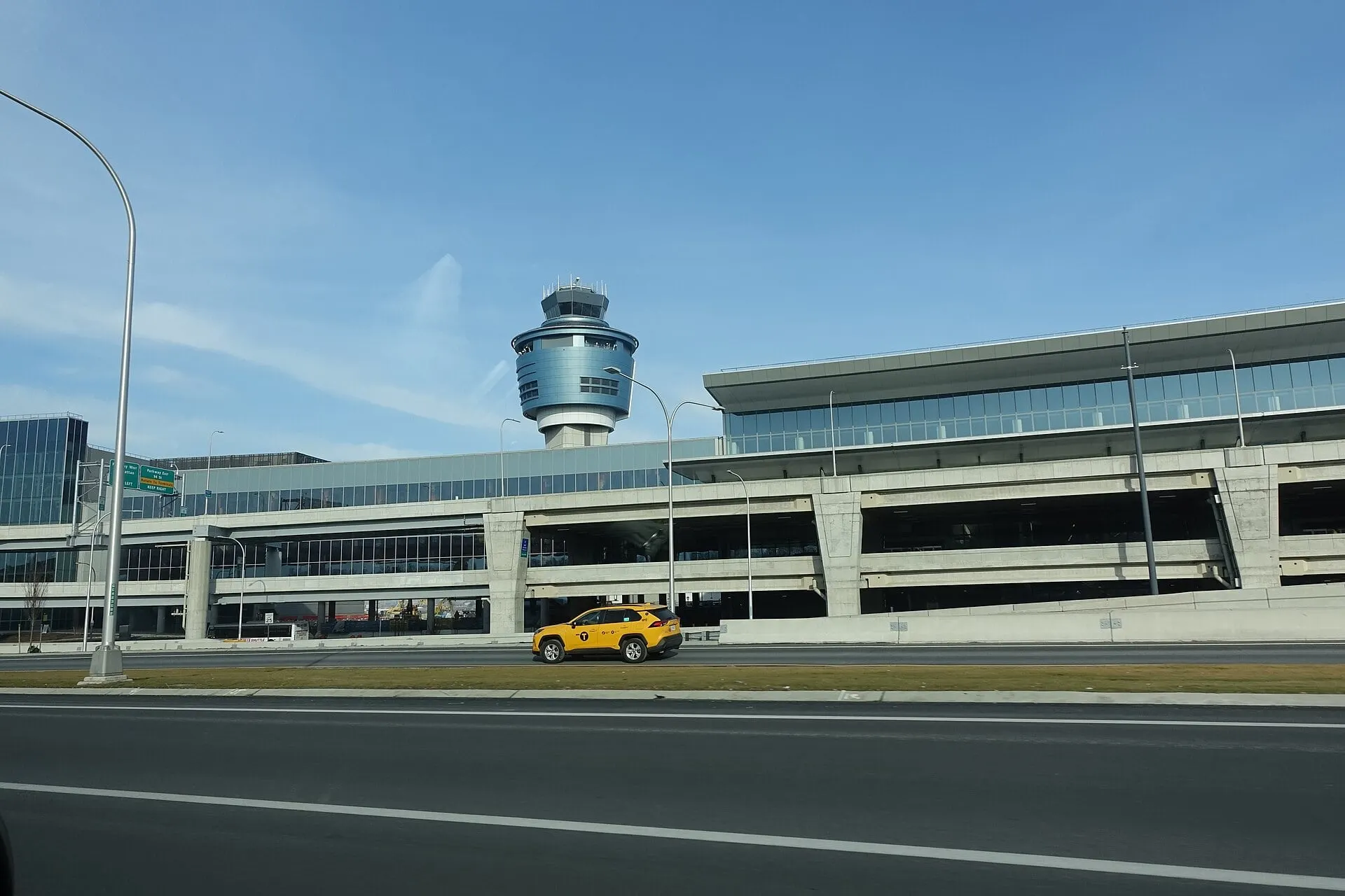 The new Terminal B and control tower at LaGuardia seen from the Grand Central Parkway