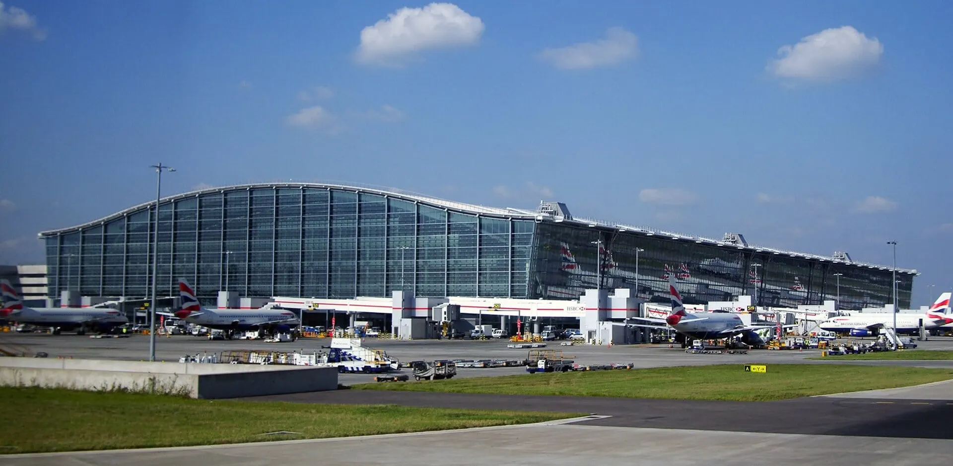 Heathrow Terminal 5 and its glass facade, with British Airways aircraft at the gates