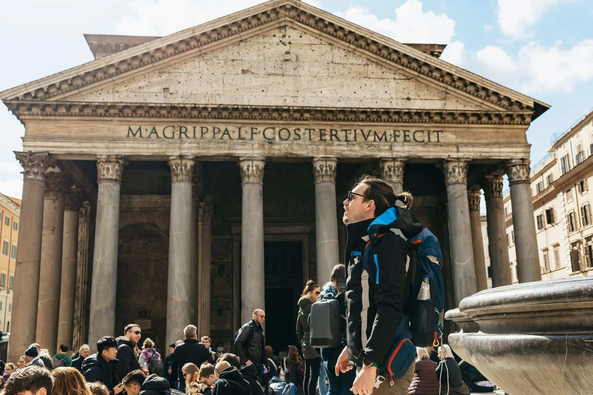 The portico of the Pantheon with crowds in Piazza della Rotonda