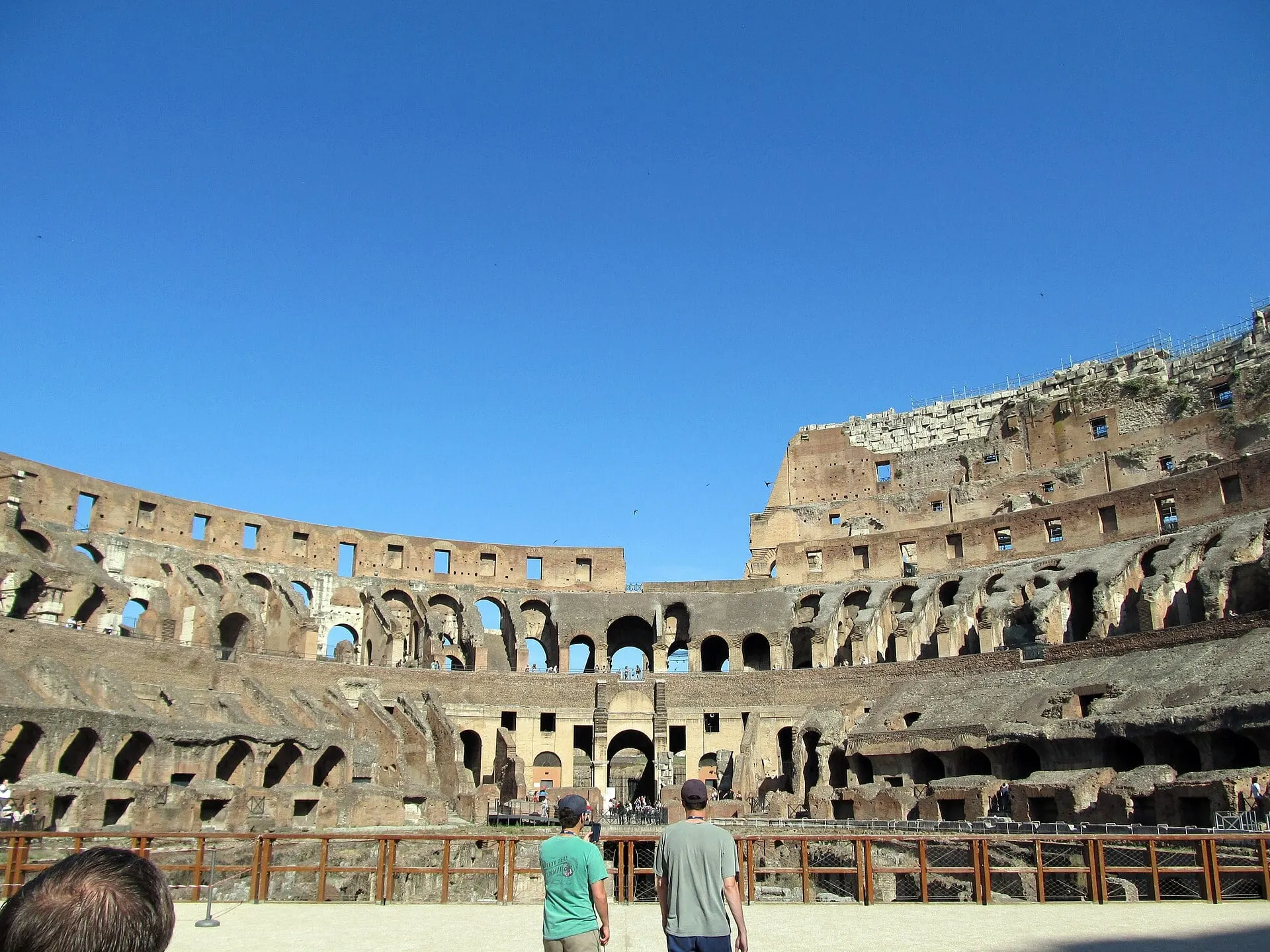 Inside the Colosseum, looking across the arena to the tiers of ruined seating