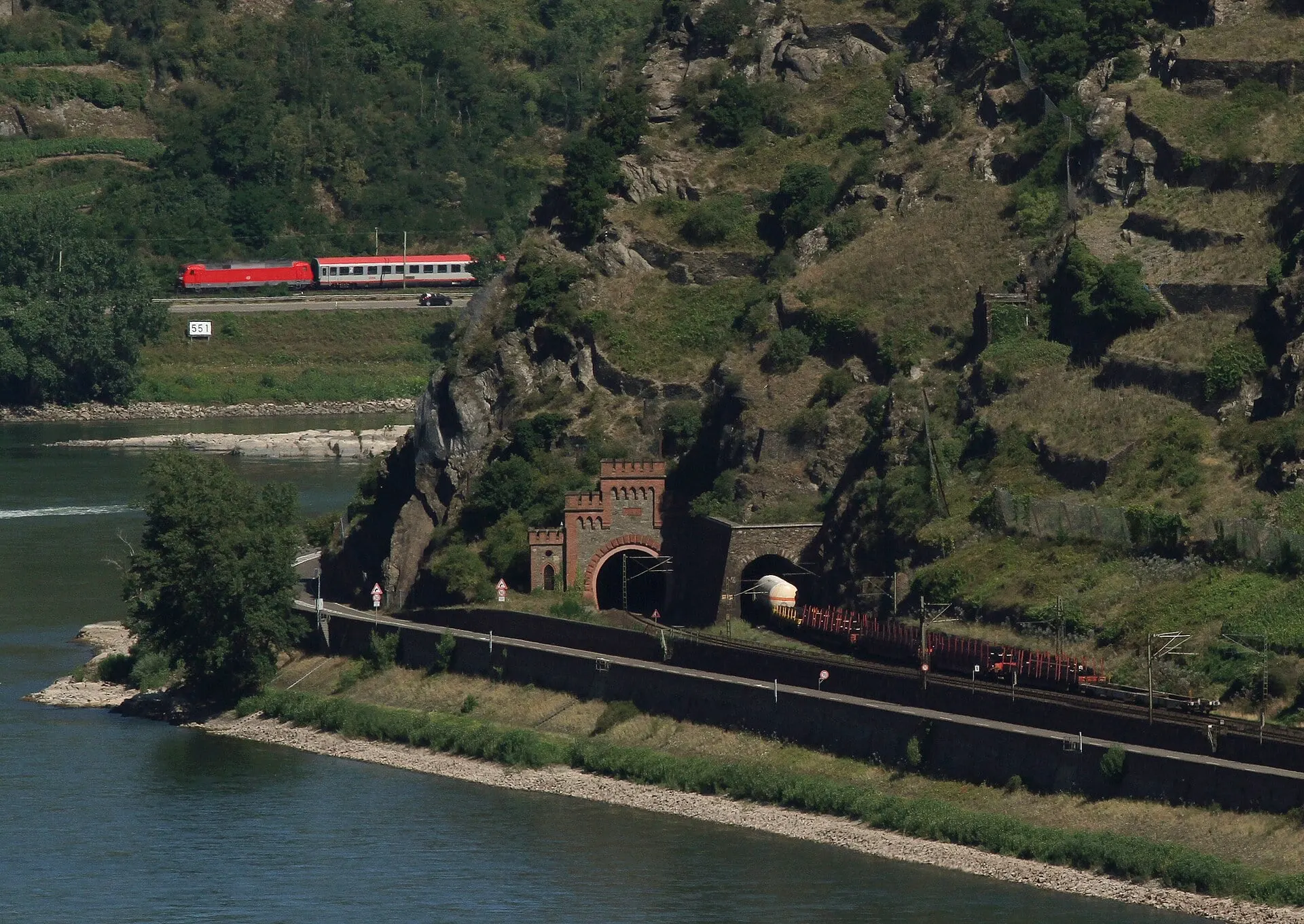 An Intercity train on the Rhine valley line near Oberwesel, above the castellated portals of the Rossstein tunnel.