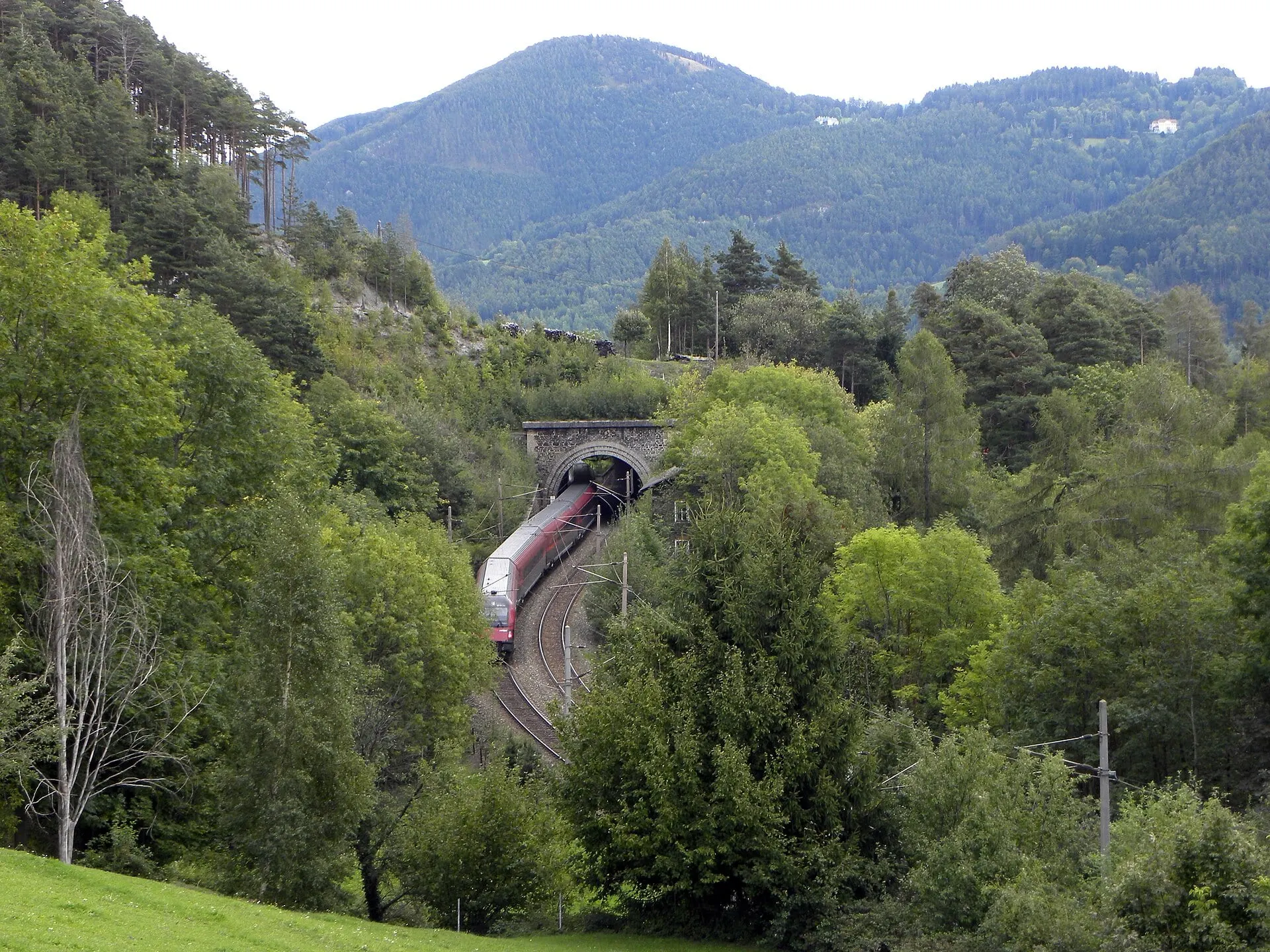 A Railjet coming out of the Rumpler tunnel on the Semmering Railway near Gloggnitz