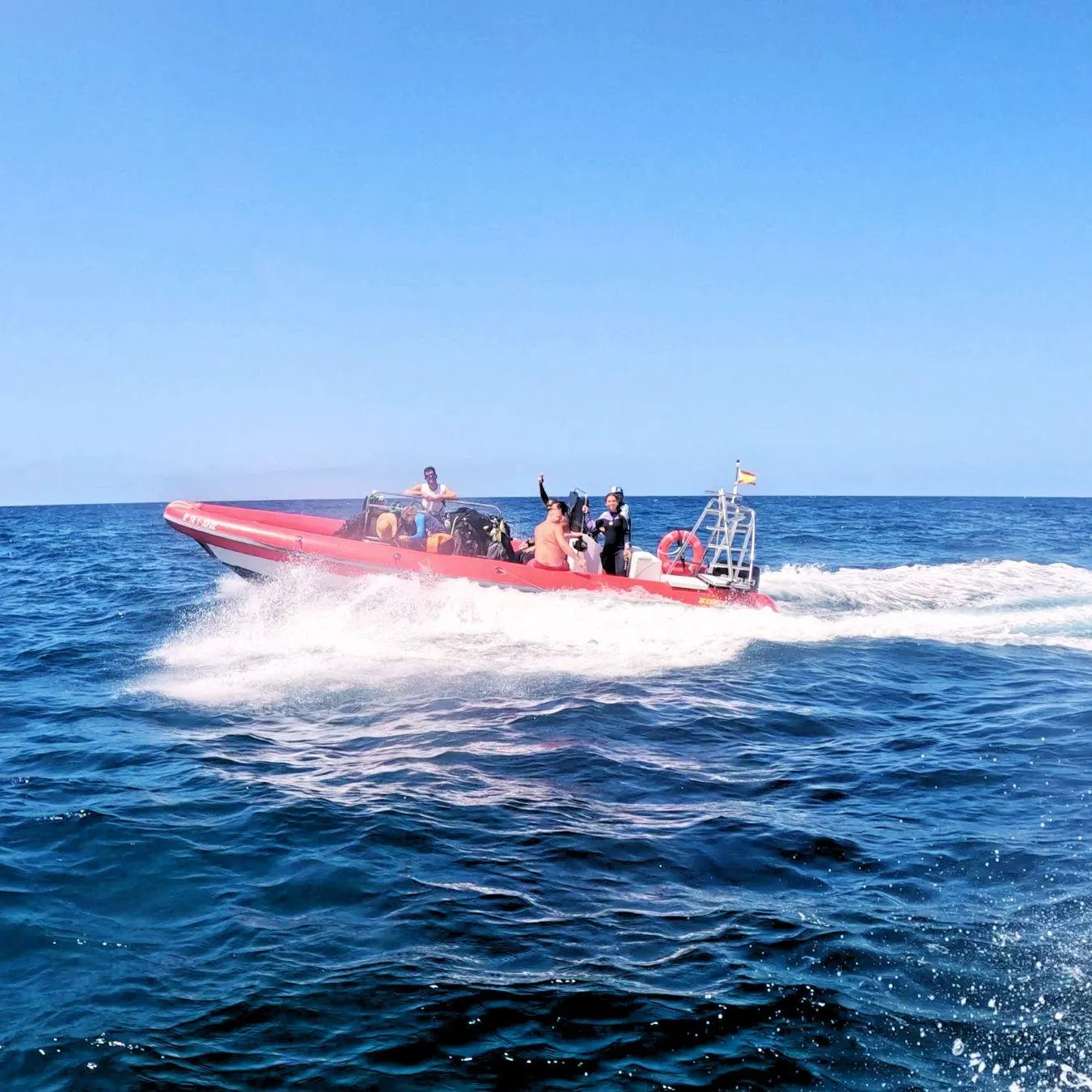 The dive centre's speedboat heading out to the dive site