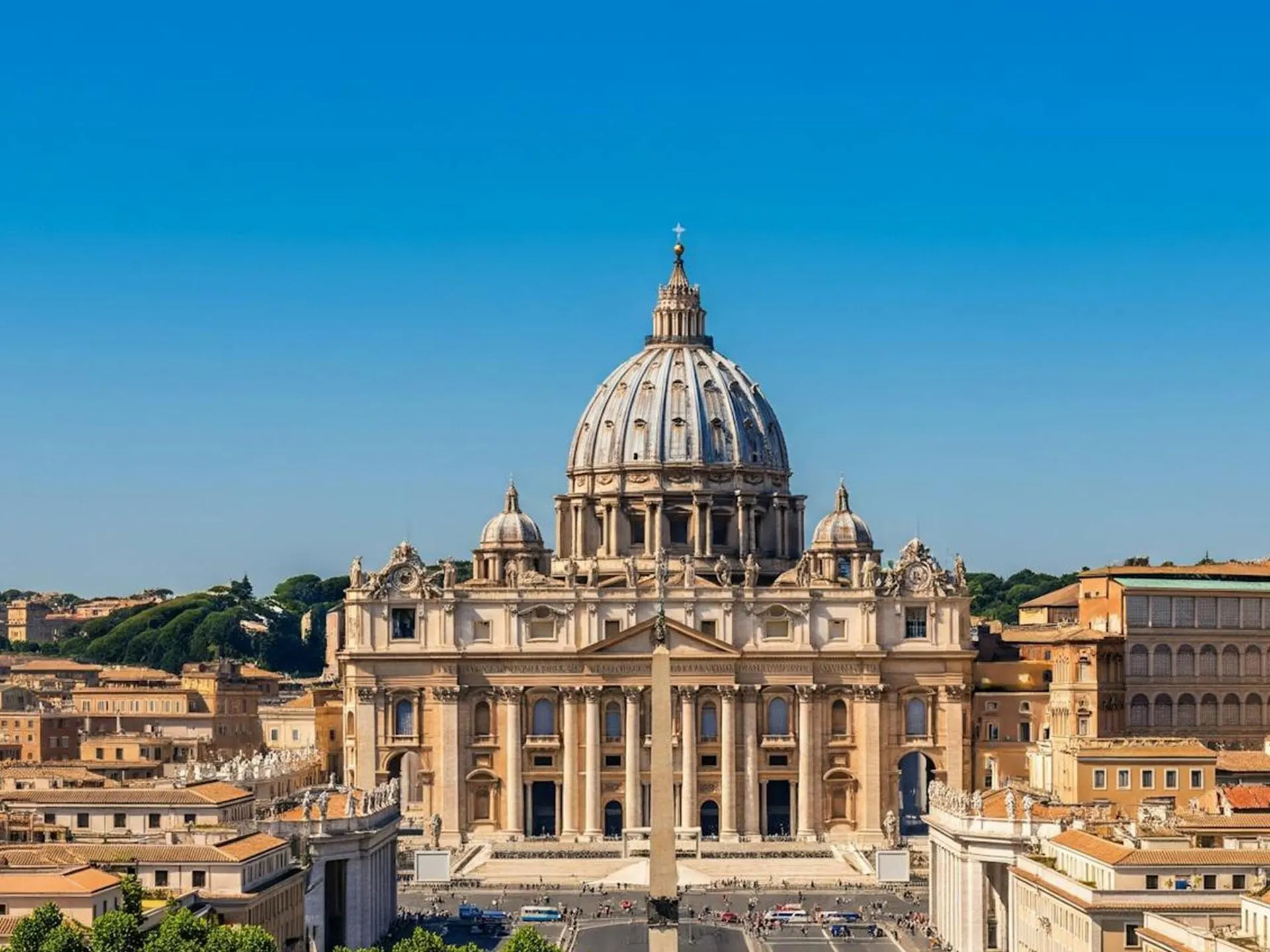 St Peter's Basilica and its dome seen across the rooftops of Rome