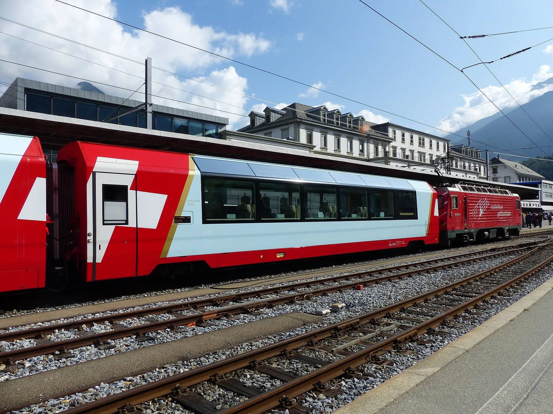 A Glacier Express panorama coach at Brig station