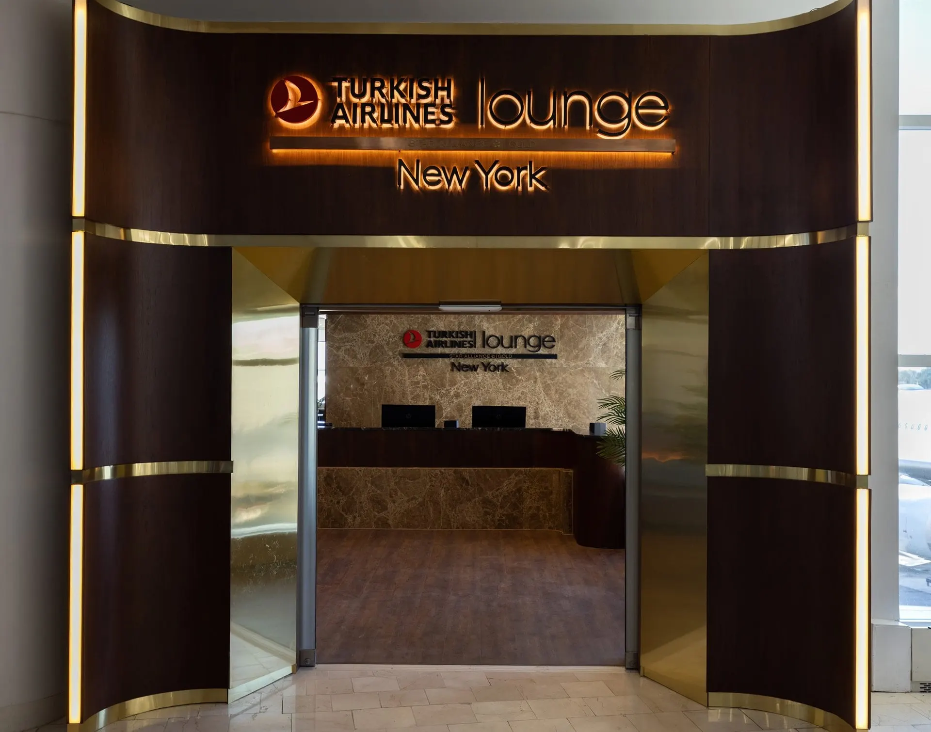 Turkish Airlines Lounge New York entrance with an illuminated sign over the reception