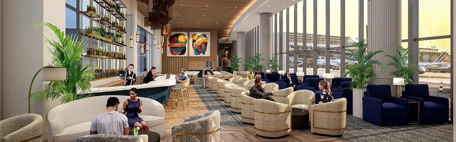 Long lounge with armchairs, a long bar and tall windows onto the airfield