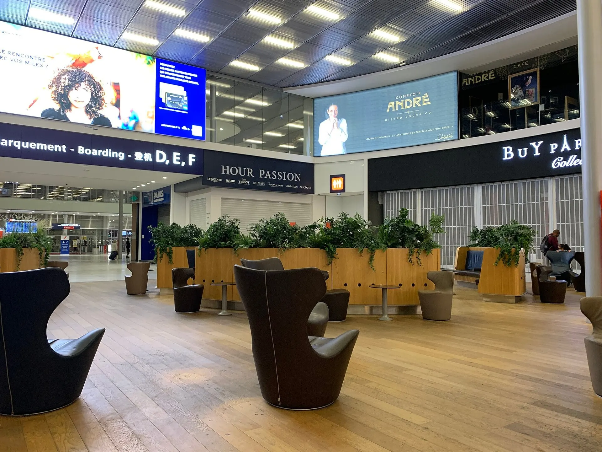 A seating area in the departures hall at Paris Orly, by the boarding gates