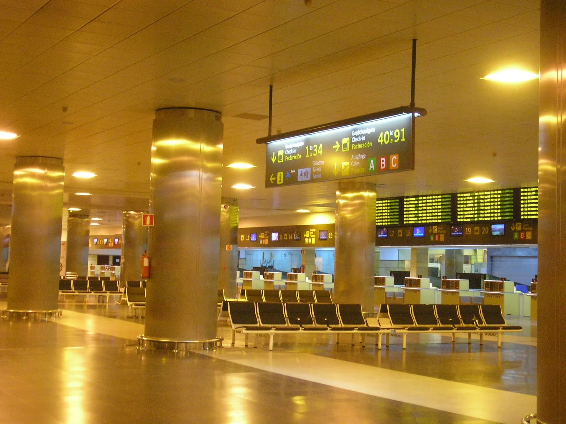 The check-in hall and departure boards in the inter-island check-in area at Gran Canaria Airport