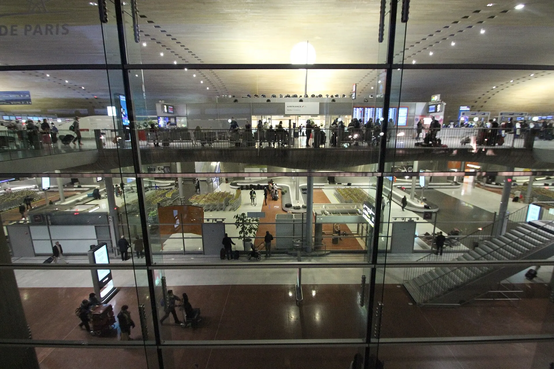 Looking down through the glass into the levels of Terminal 2E at Paris Charles de Gaulle